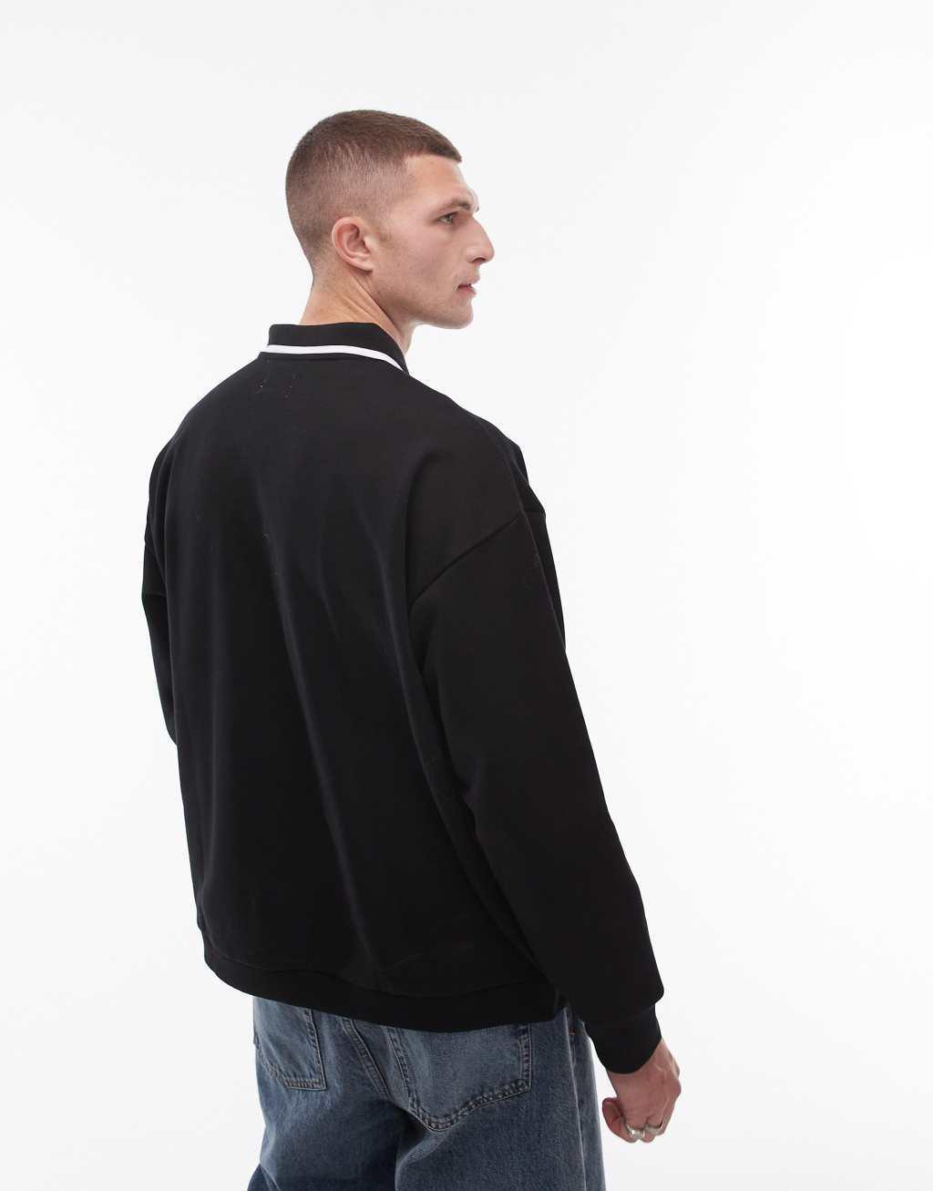 Topman oversized fit polo sweatshirt with tipped collar in black Product Image