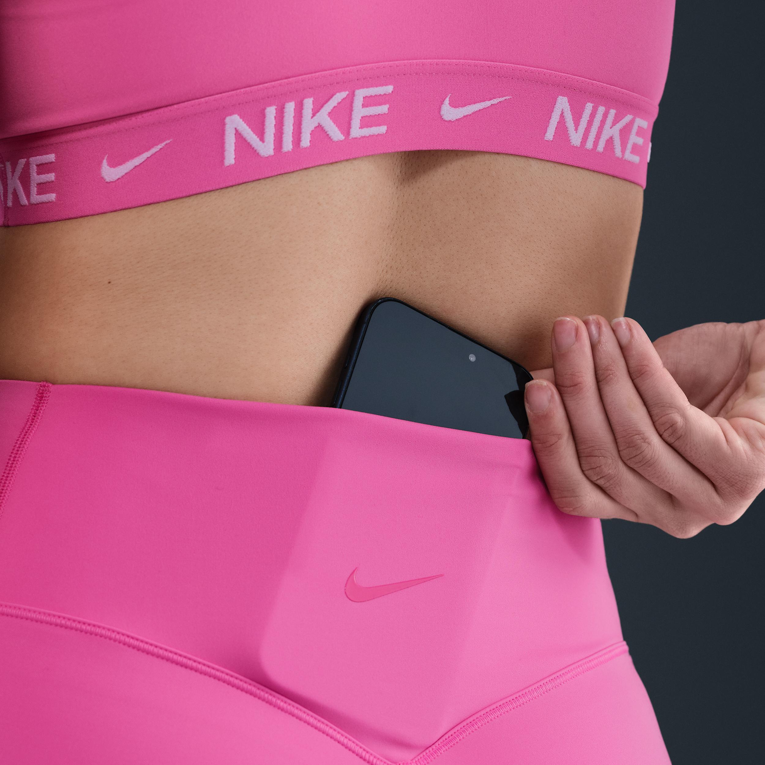 Nike Women's Universa Medium-Support High-Waisted 8" Biker Shorts with Pockets Product Image