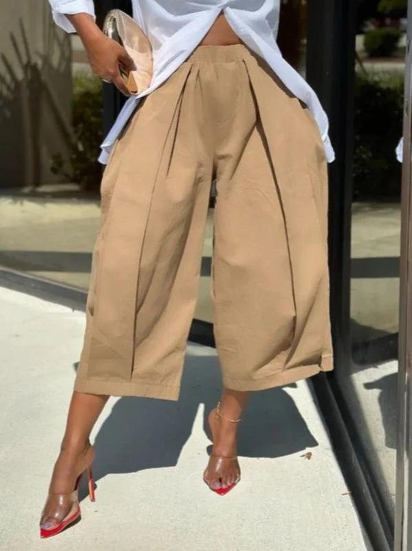 Loose Wide Leg Pleated Pockets Solid Color Pants Product Image