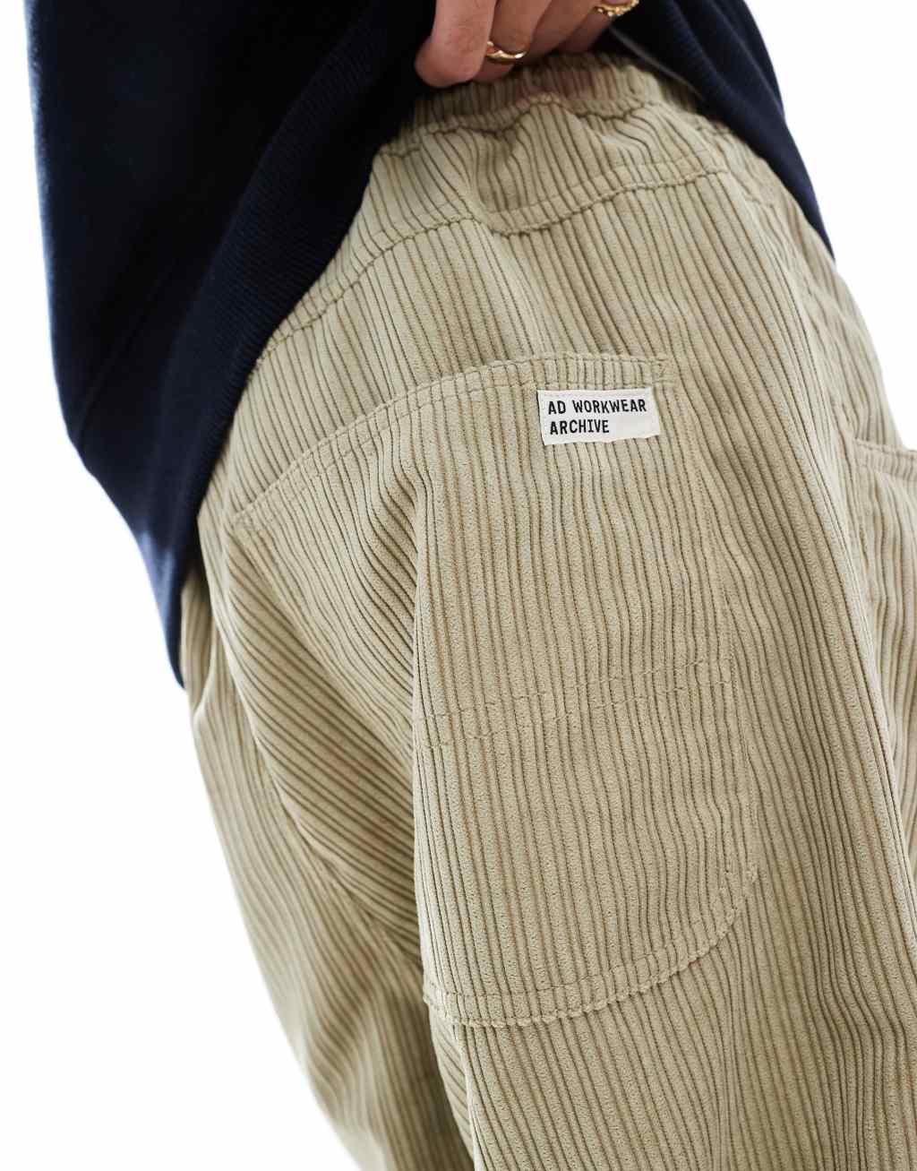 ASOS DESIGN tapered cord pants in beige  Product Image