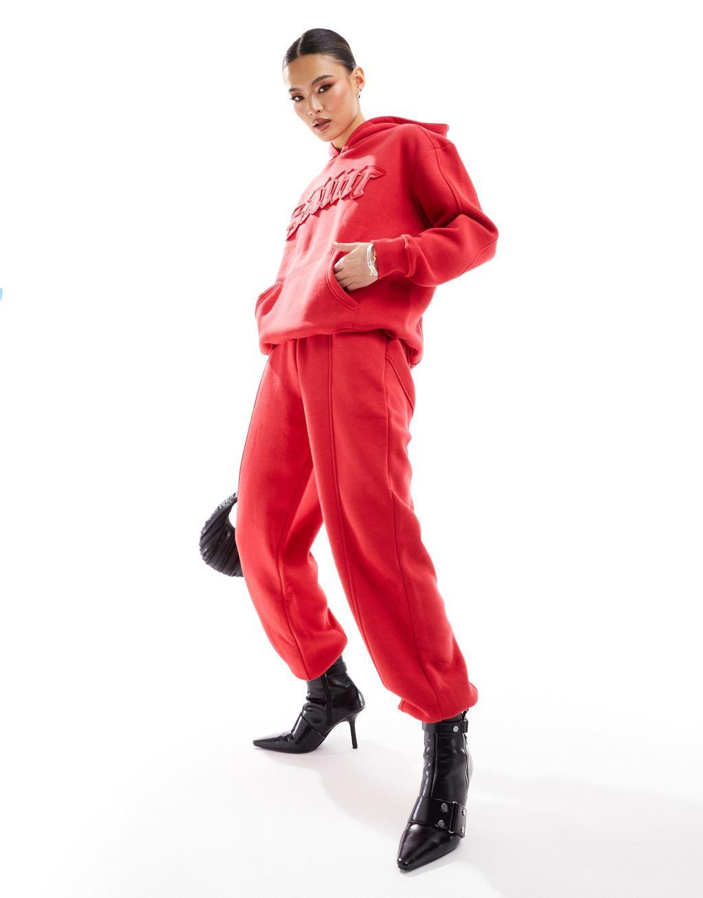 Murci exclusive saint motif sweatpants in red - part of a set Product Image