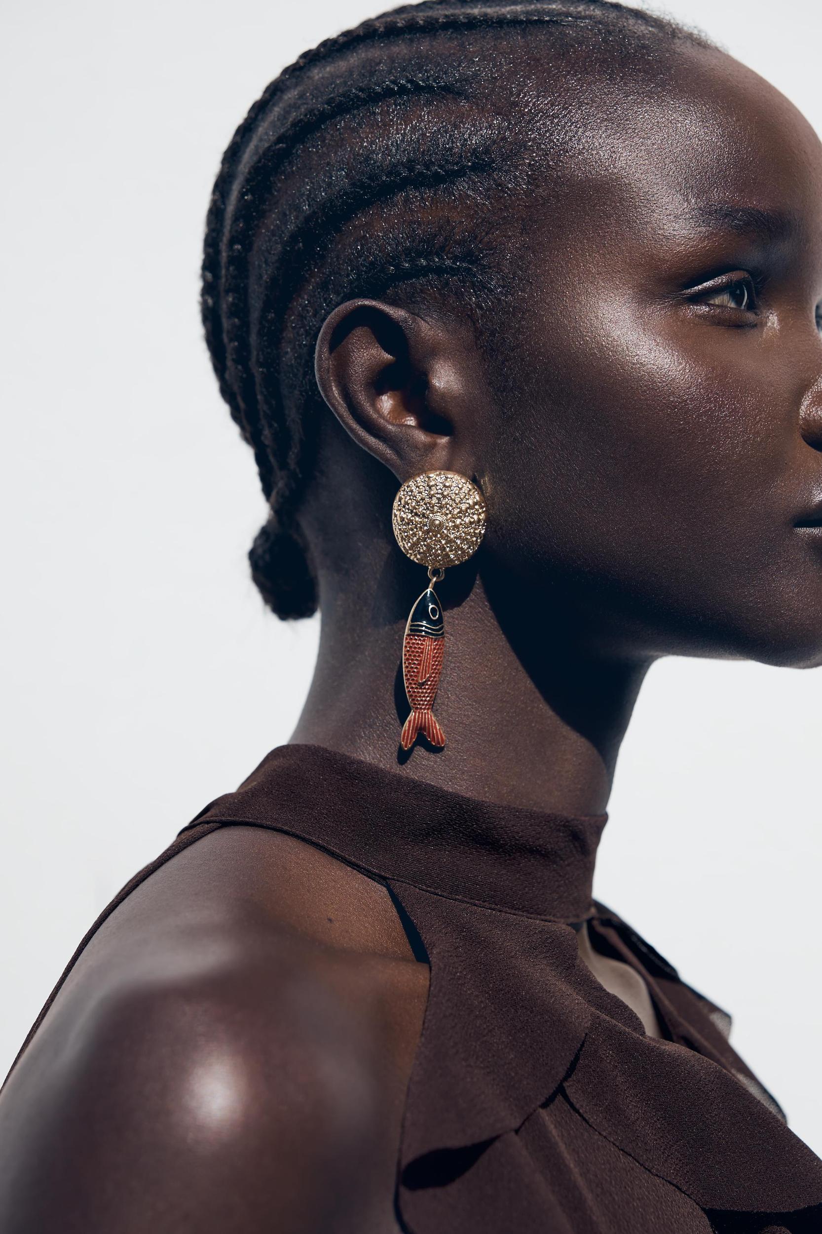 CIRCULAR FISH EARRINGS Product Image