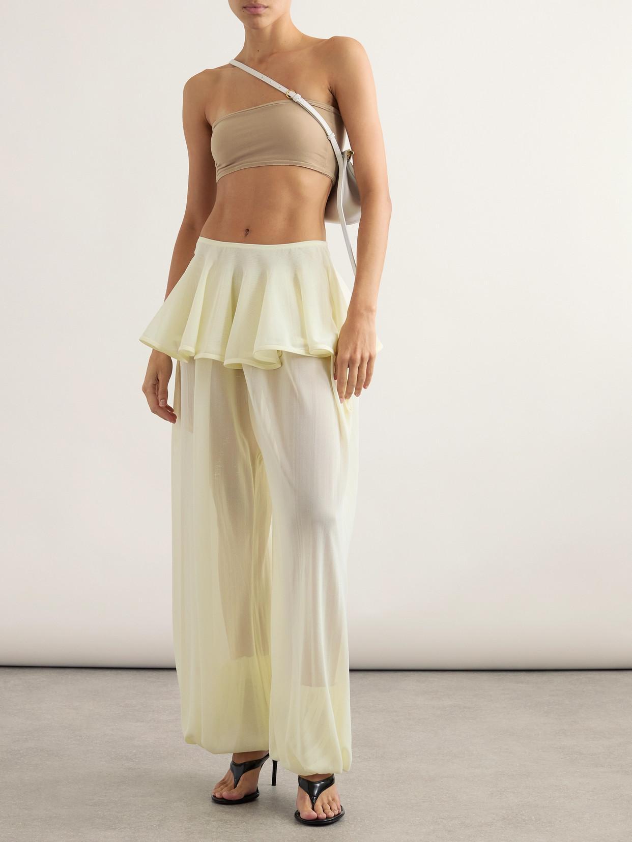 ALAÏA Pleated Georgette Peplum Tapered Pants In Yellow Product Image