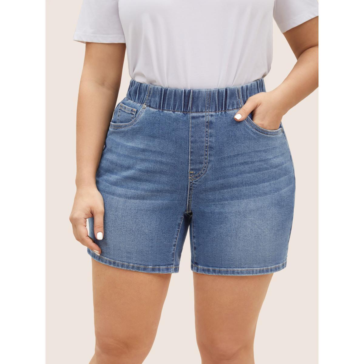Plus Size Dark Wash Elastic Waist Roll Hem Denim Shorts Women Denimlightblue Roll Hem Medium stretch Everyday Slanted pocket Casual Denim Shorts BloomChic 16/1X Product Image