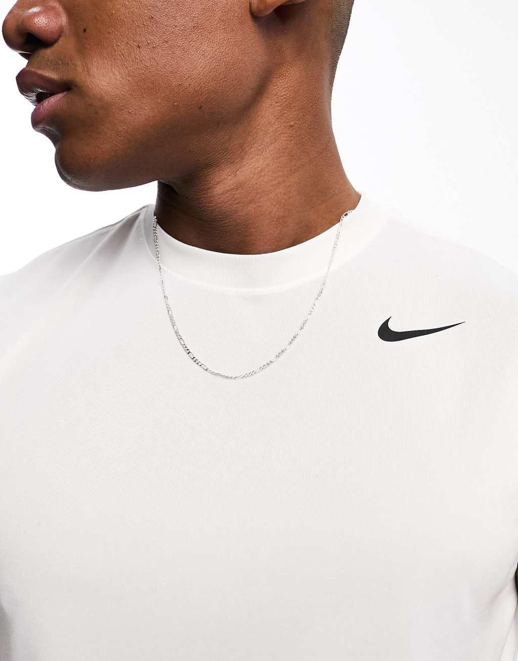 Nike Training Dri-FIT tank top in white Product Image