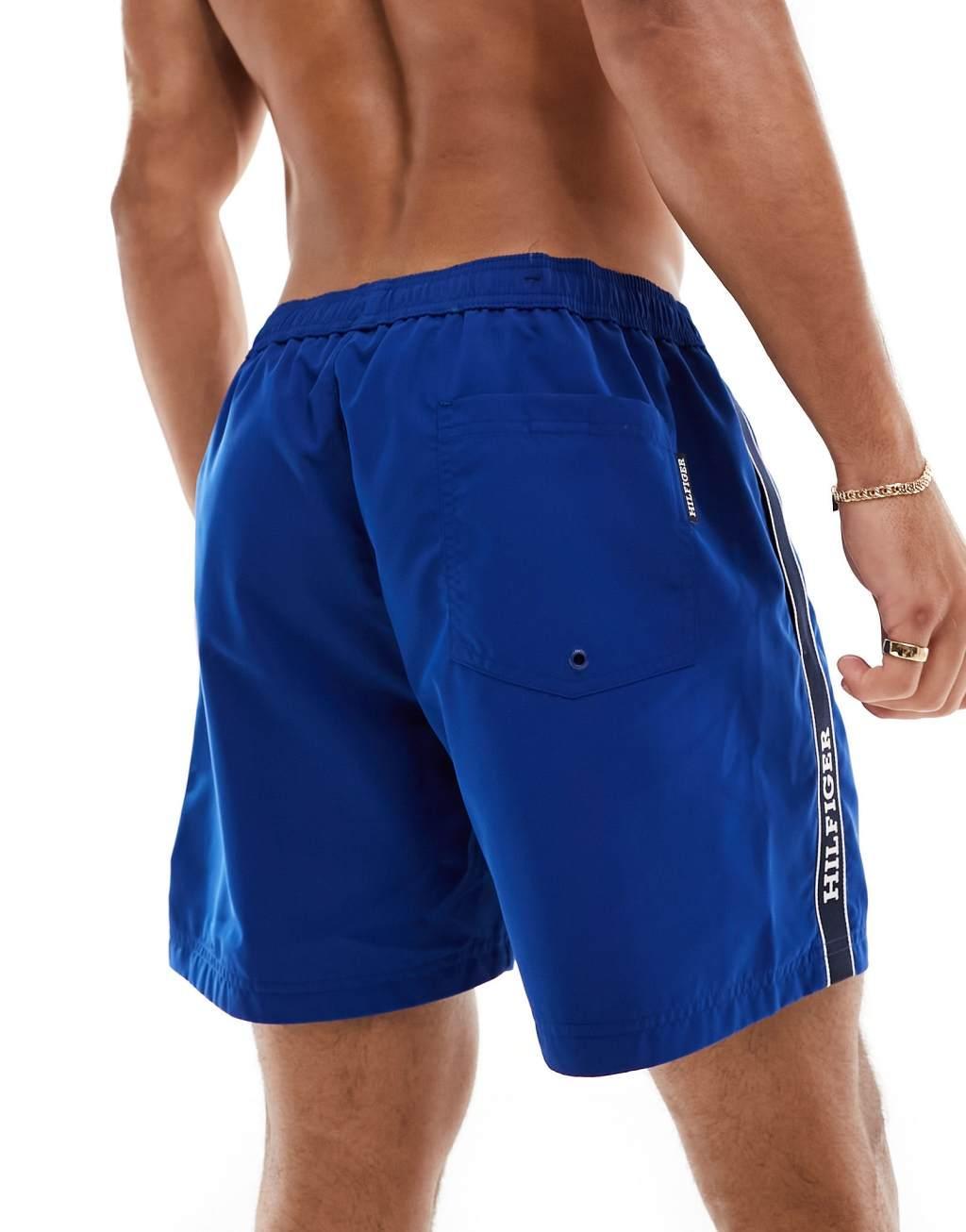 Tommy Hilfiger monotype medium drawstring tape swim shorts in blue Product Image