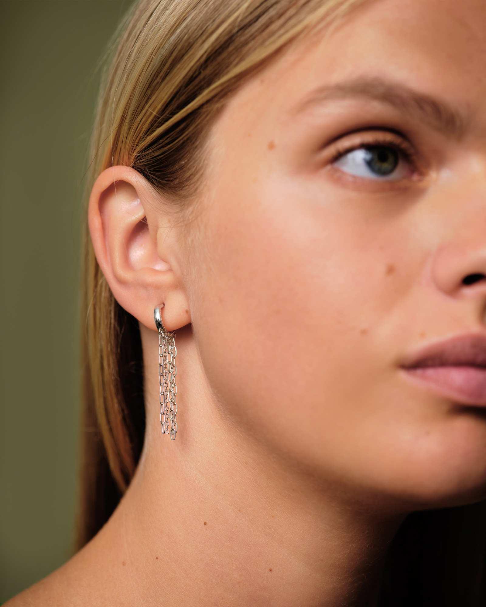 Eve Huggie Earrings in Silver Product Image