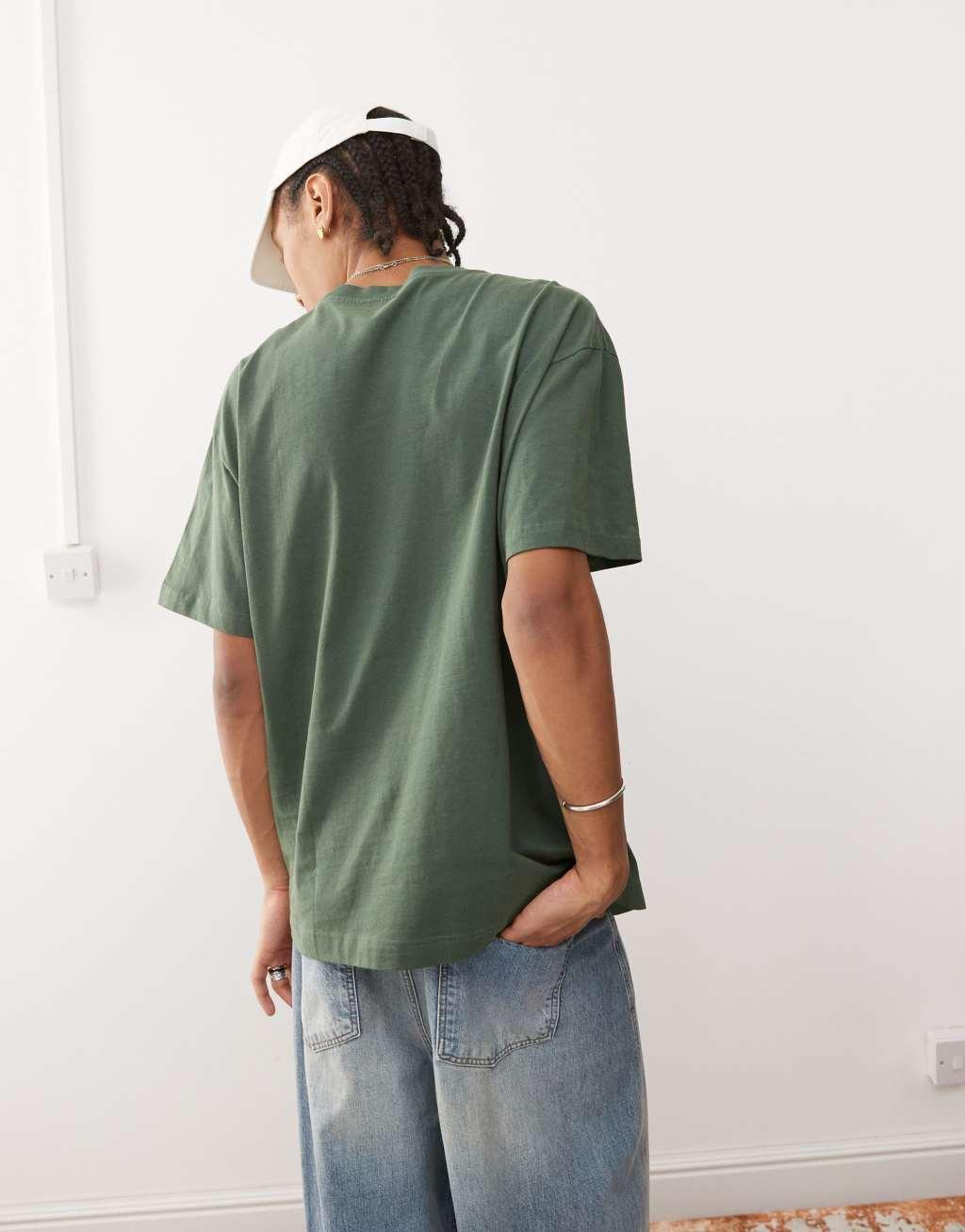 Weekday oversized t-shirt with college graphic print in washed green Product Image