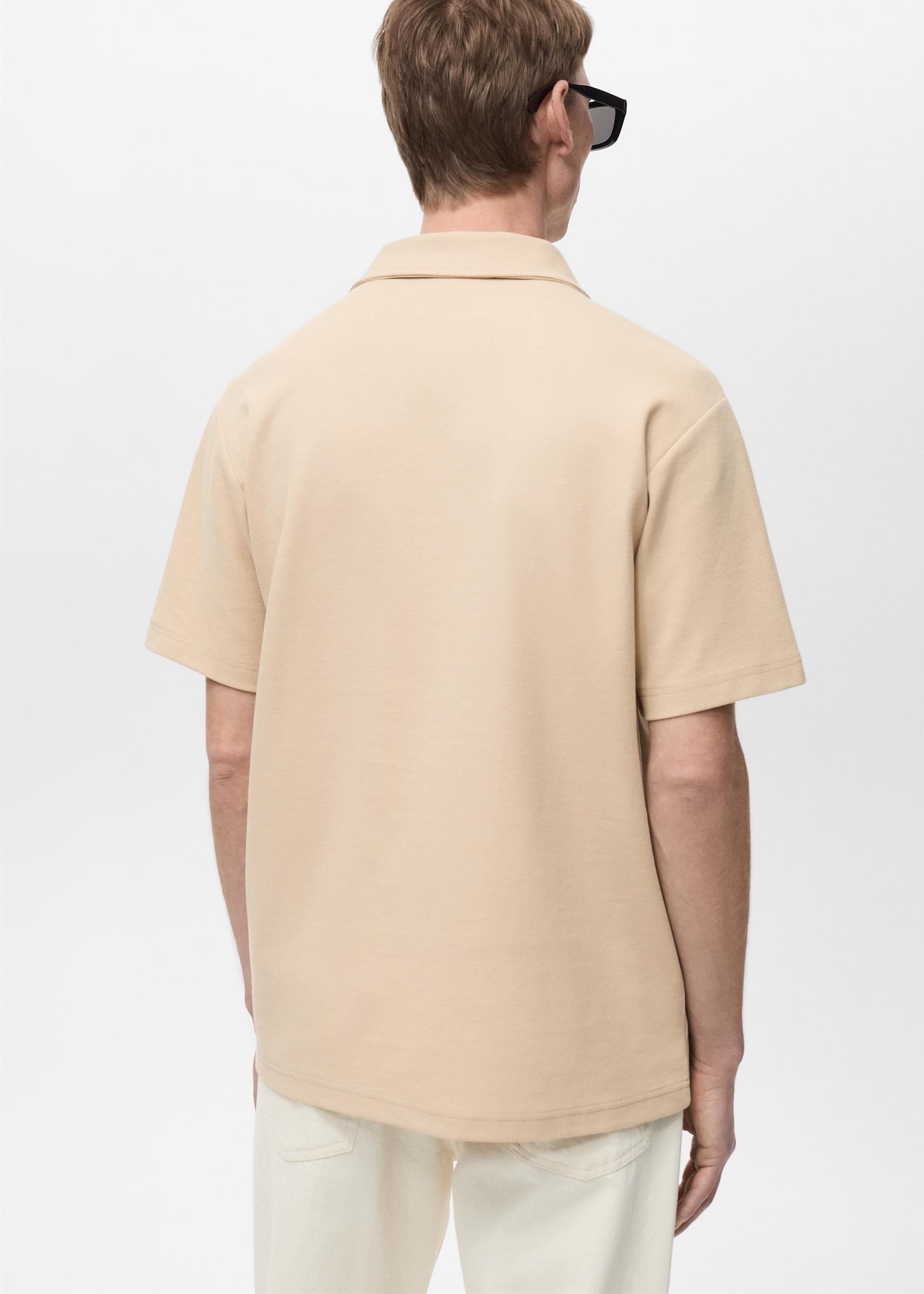Structured polo shirt with zipper collar - Men | MANGO USA Product Image