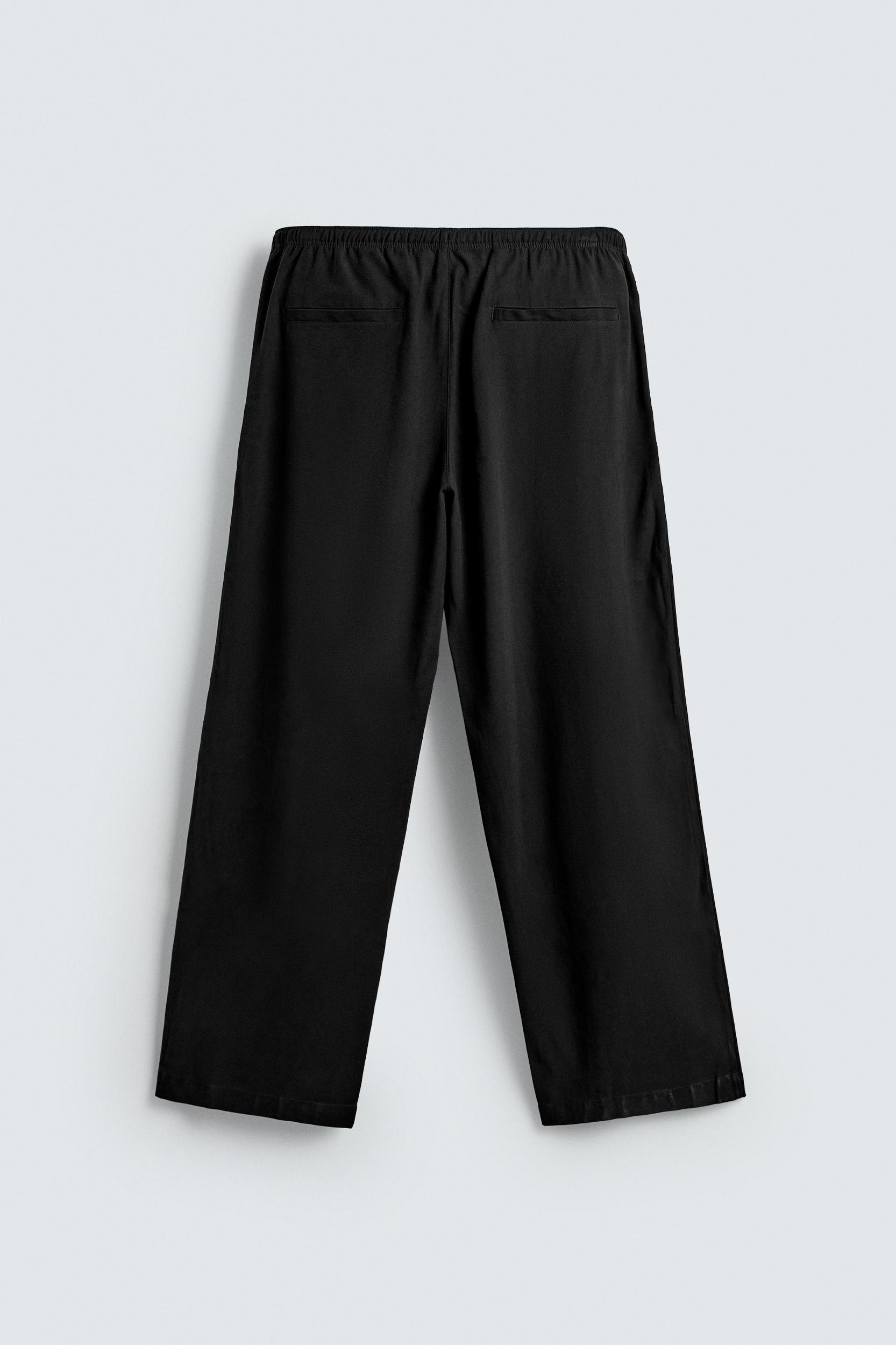 RELAXED FIT FLOWY PANTS Product Image