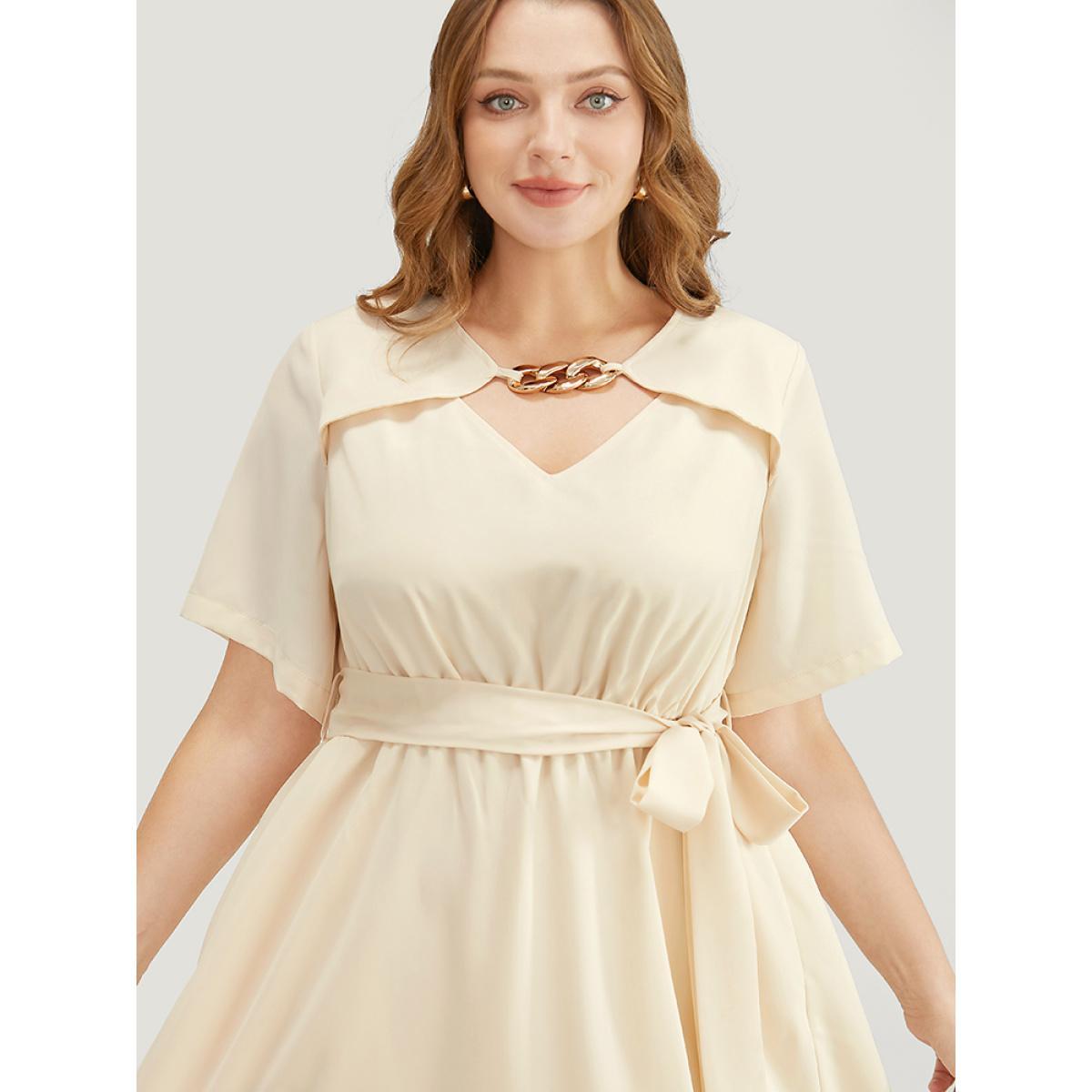 Plus Size Solid Chain Detail Cut Out Pocket Belted Flutter Dress Beige Women Office Cross straps V-neck Short sleeve Curvy Midi Dress BloomChic 10/M Product Image