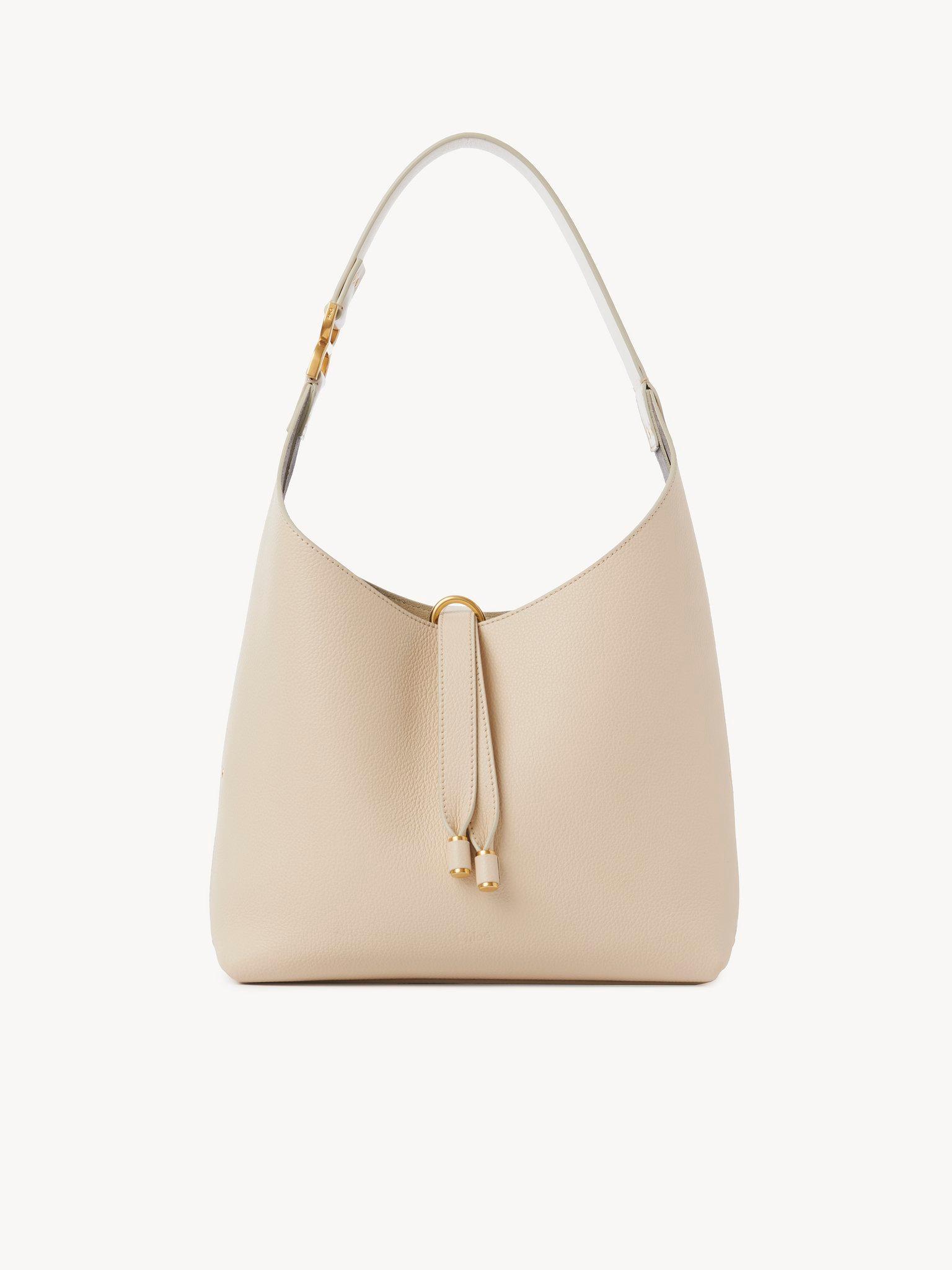 Small Marcie hobo bag in grained leather Product Image