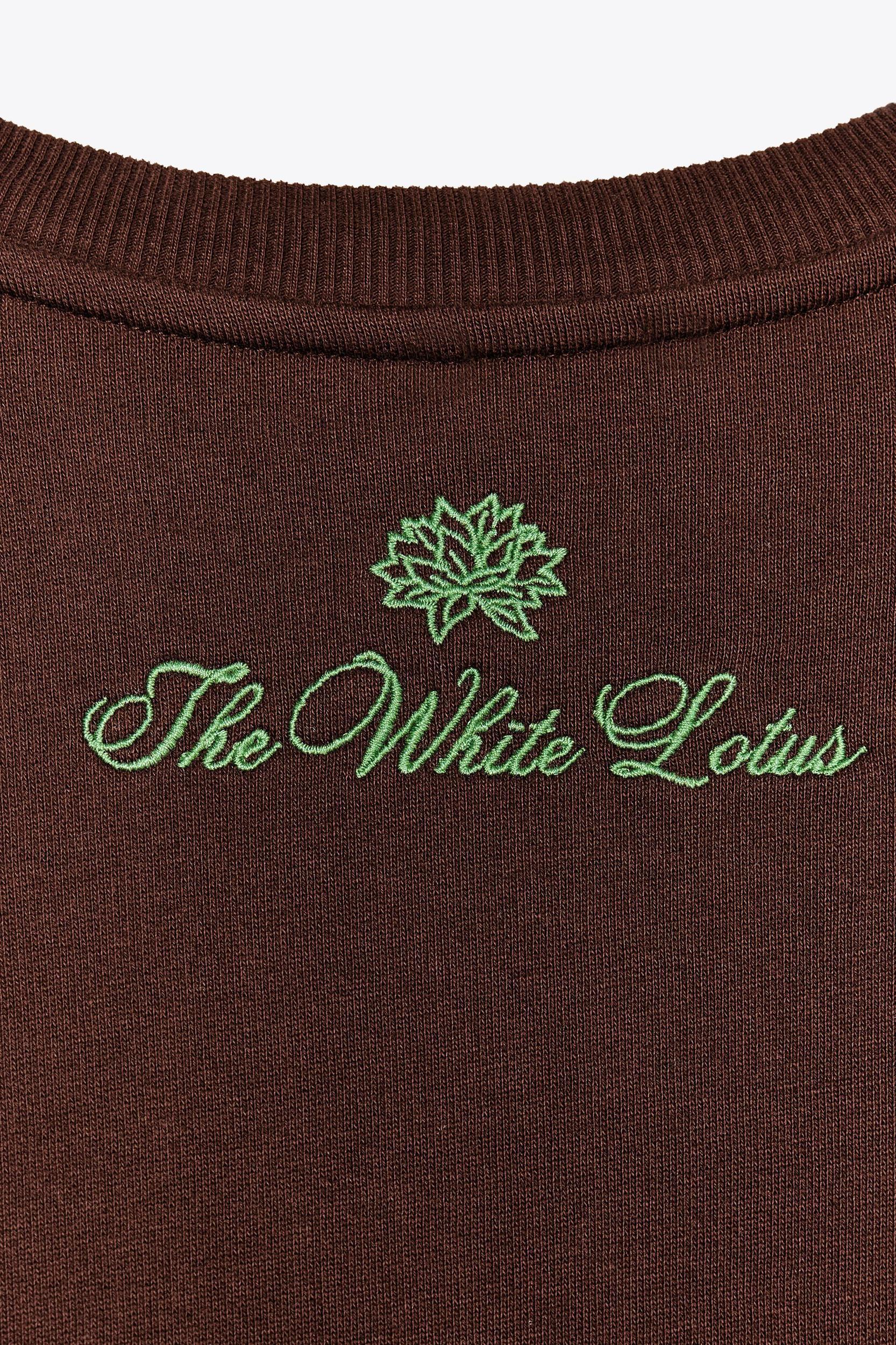 THE WHITE LOTUS FLEECE SWEATSHIRT Product Image