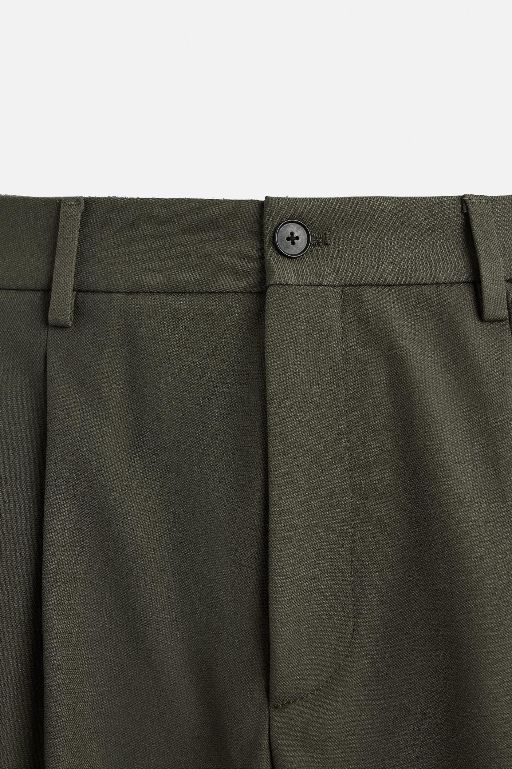 RELAXED FIT PLEATED PANTS Product Image