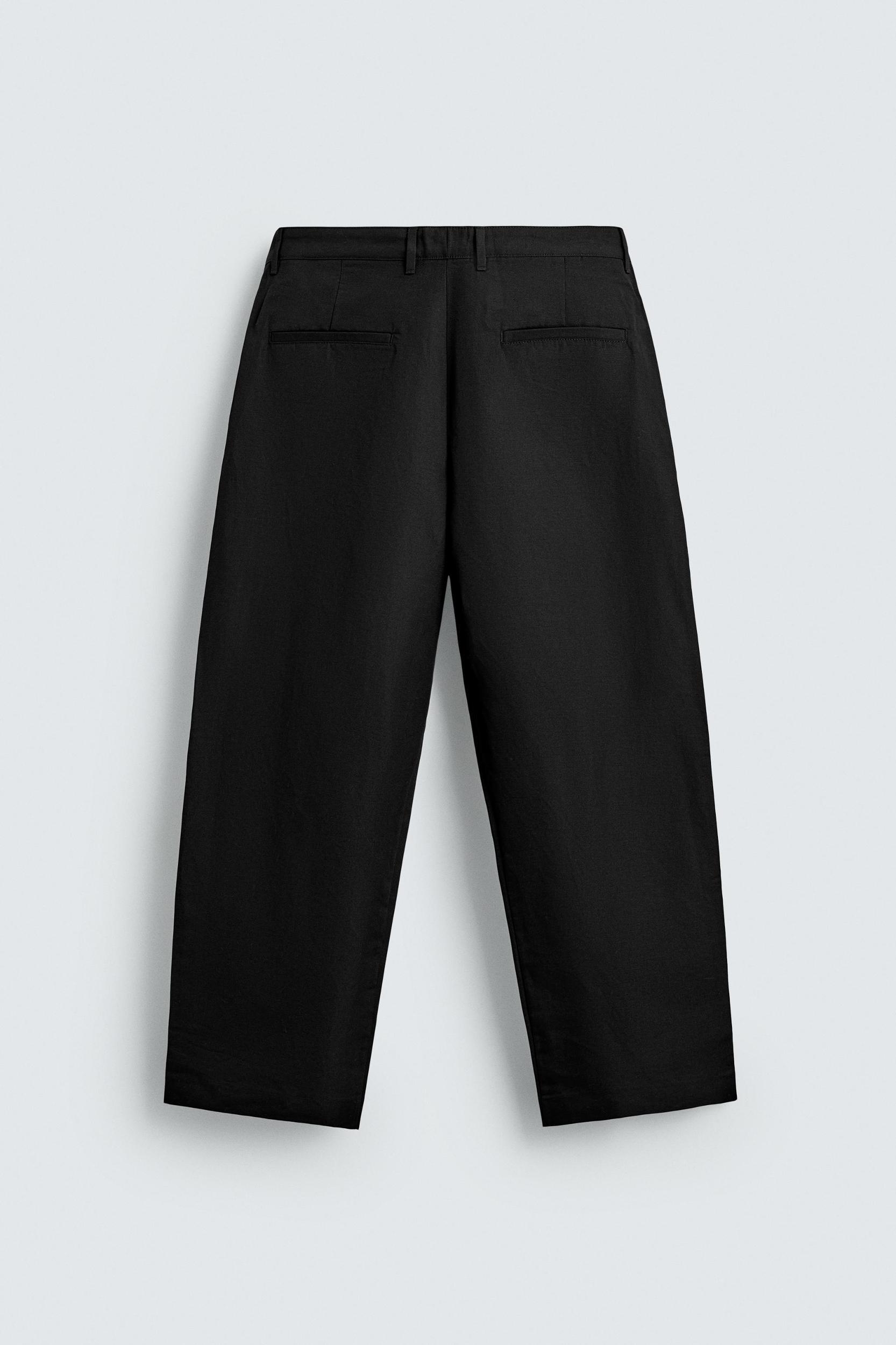 RELAXED FIT PLEATED PANTS Product Image