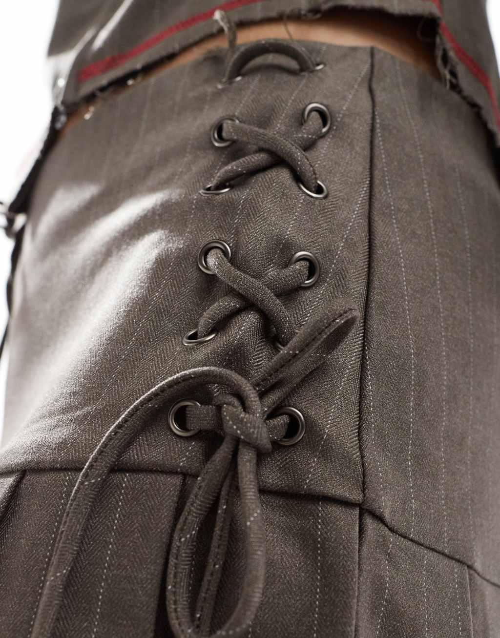 COLLUSION pleated mini skirt with lace up detail and raw hem - part of a set Product Image