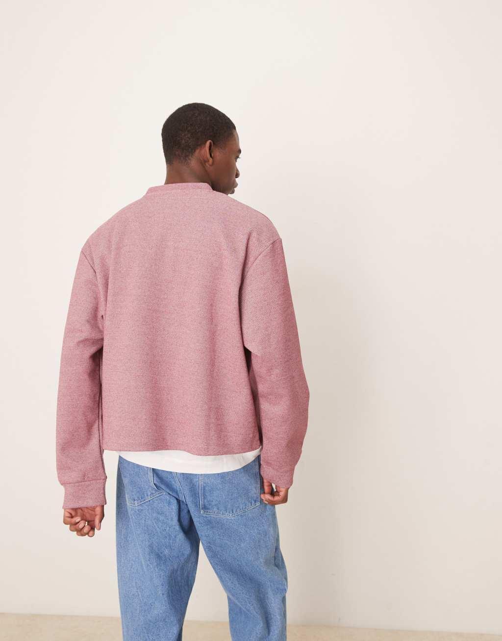 ASOS DESIGN oversized boxy pique sweater with henley neck in dark pink Product Image
