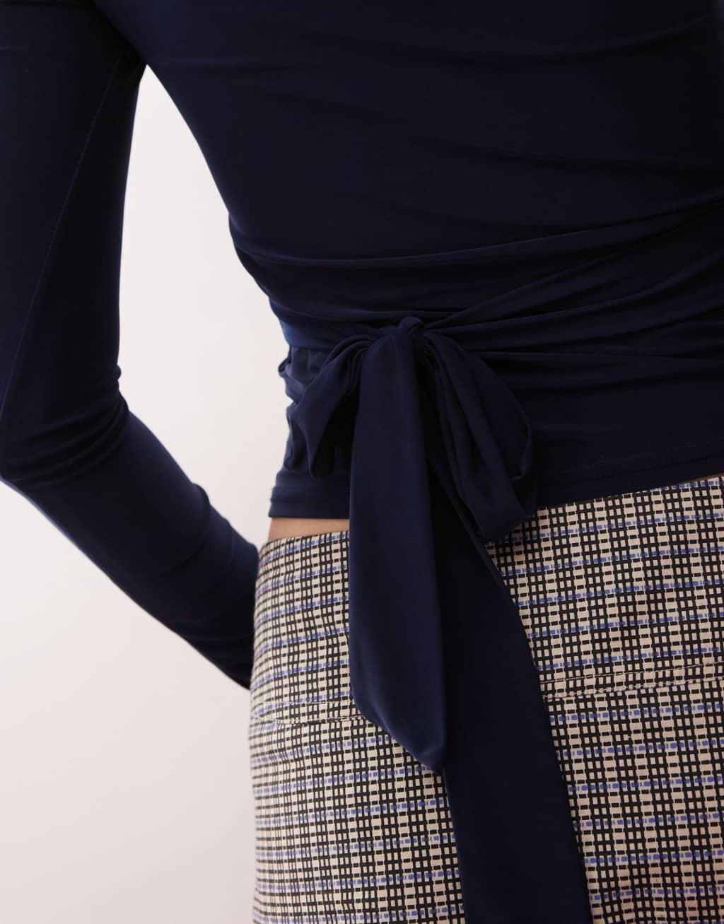 COLLUSION tie waist long sleeve slash neck top in navy Product Image