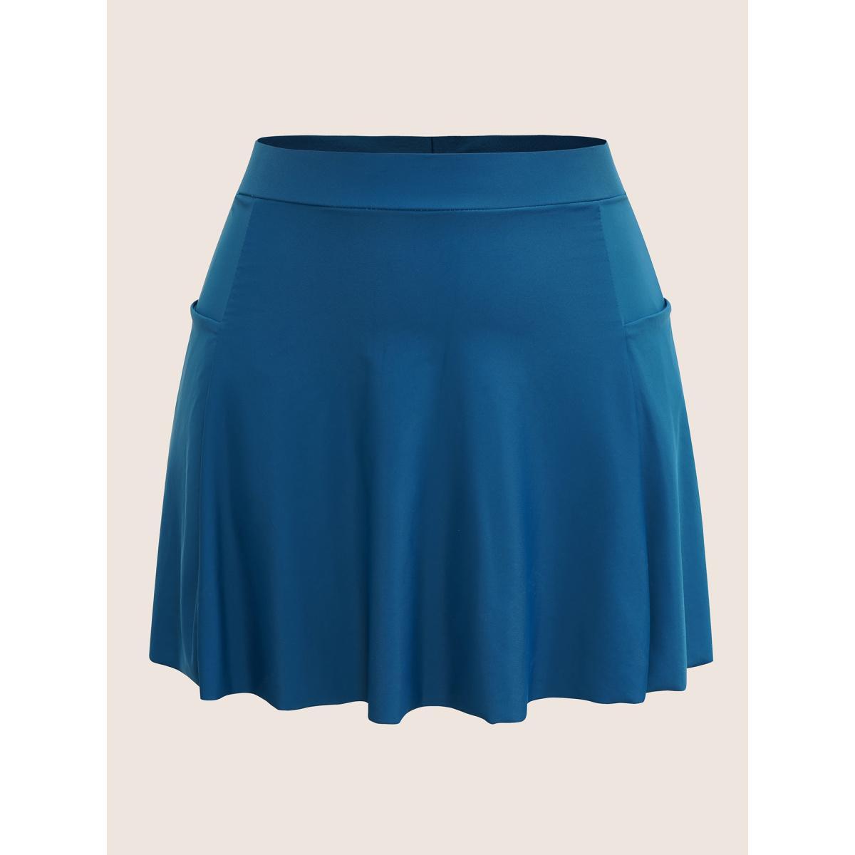 Plus Size Solid Patched Pocket Side Pleated Swim Skirt Women's Swimwear Indigo Beach Non High stretch Bodycon High Rise Slanted pocket Curve Swim Bottoms BloomChic 10/M Product Image