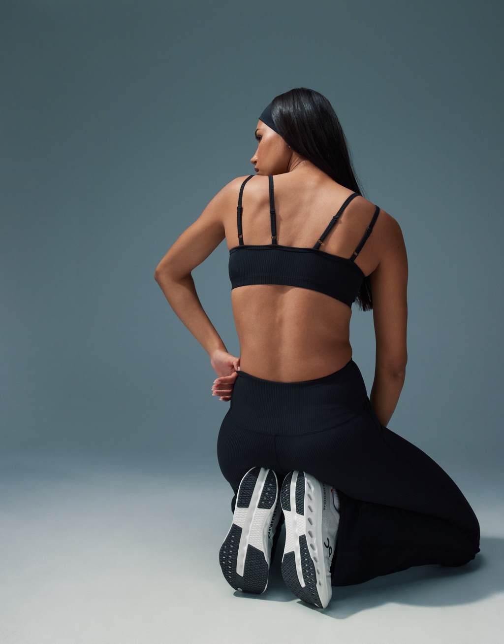4505 soft touch rib knit light support sports bra in black  Product Image