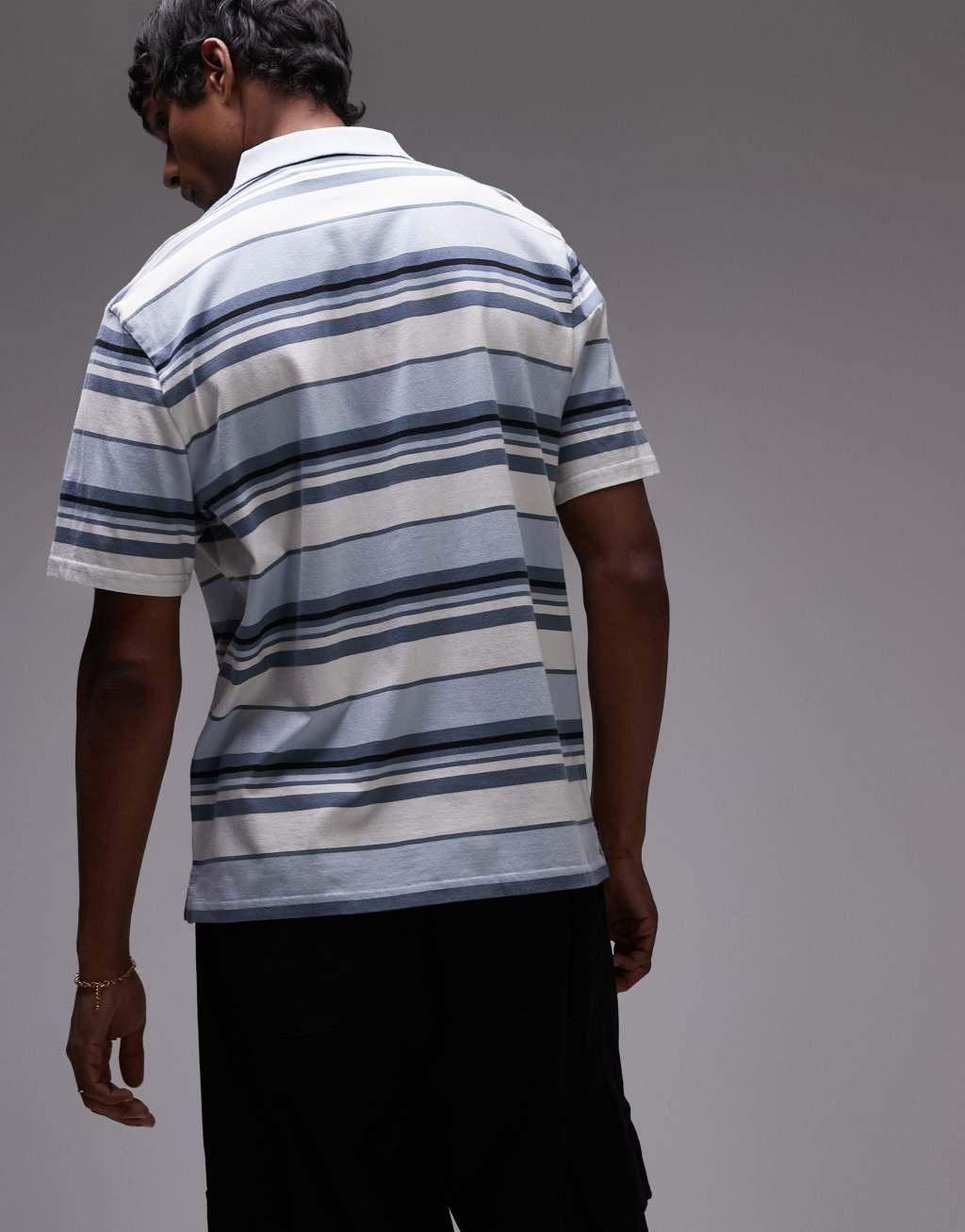 Levi's Authentic logo multi stripe jersey polo in light blue Product Image