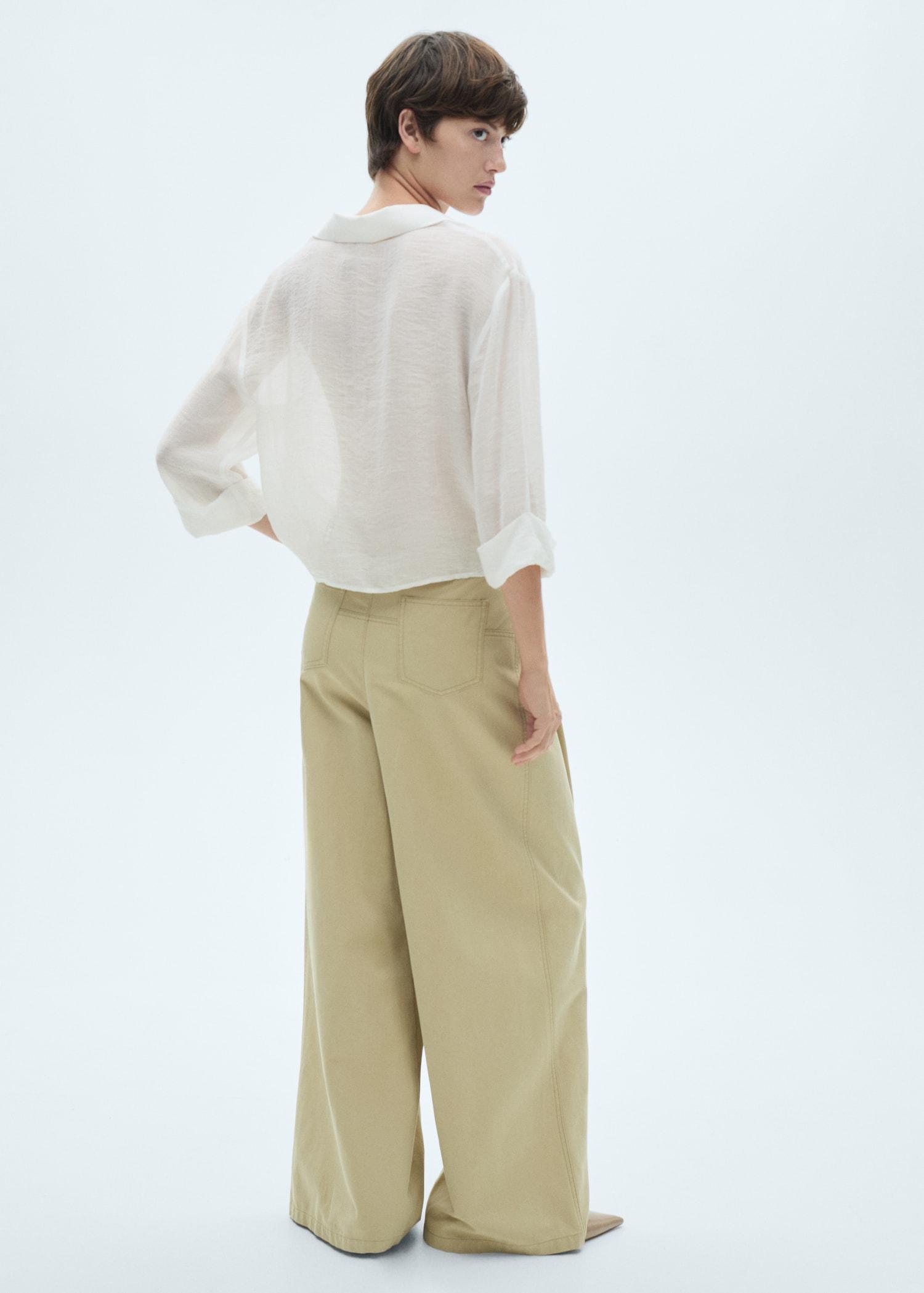 Flared-sleeve blouse with bow - Women | MANGO USA Product Image