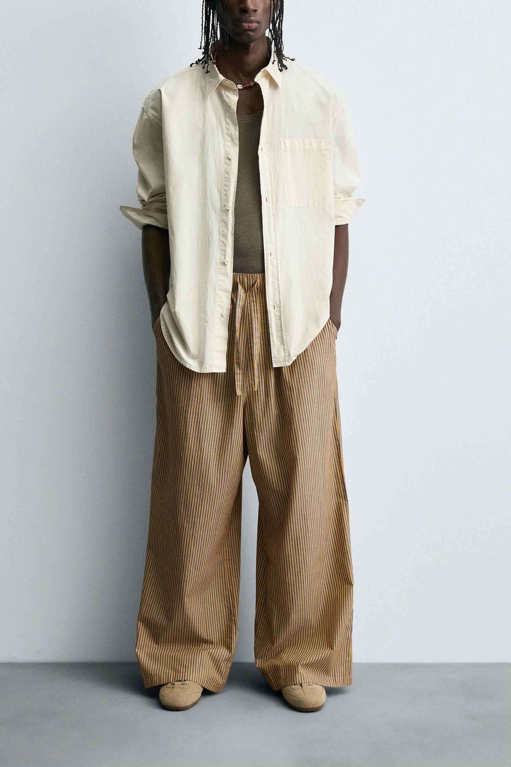STRIPED OVERSIZED FIT PANTS Product Image