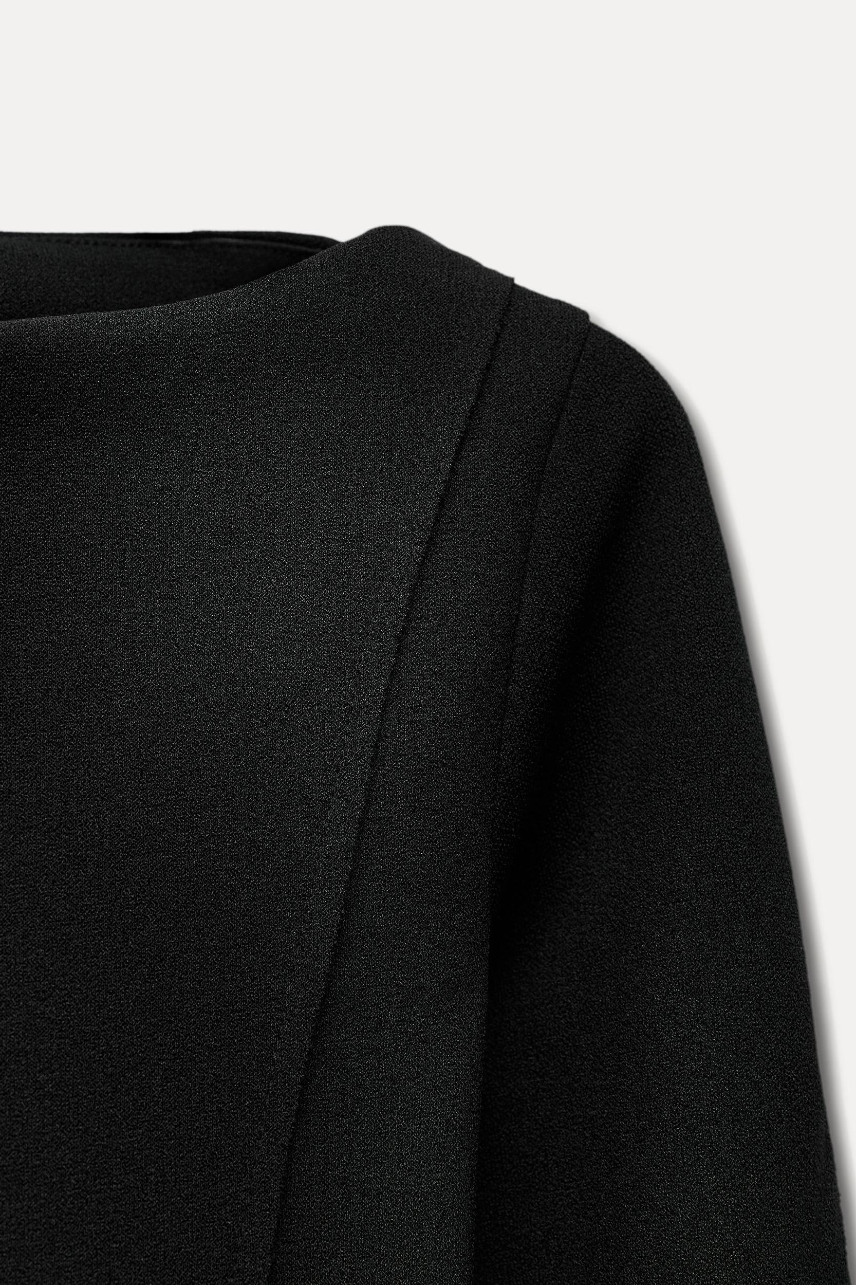 VENTED SLEEVE TOP Product Image