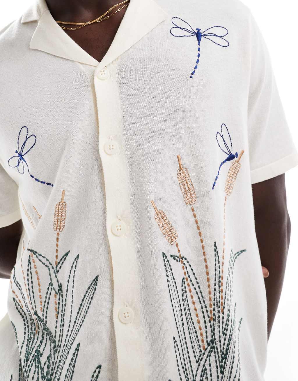 ASOS DESIGN relaxed knit button up polo with dragonfly embroidery in ecru Product Image