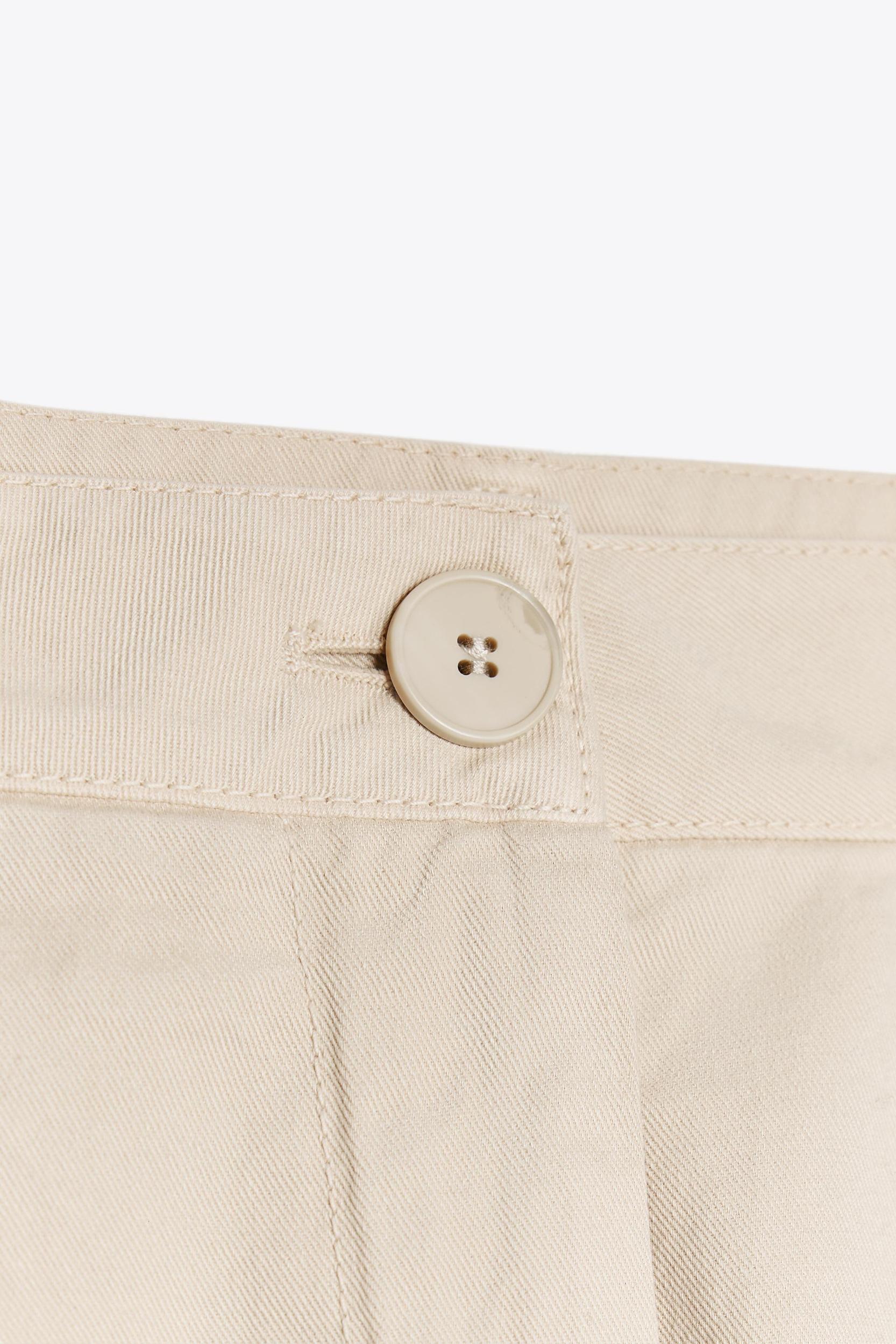 PLEATED CHINO PANTS Product Image