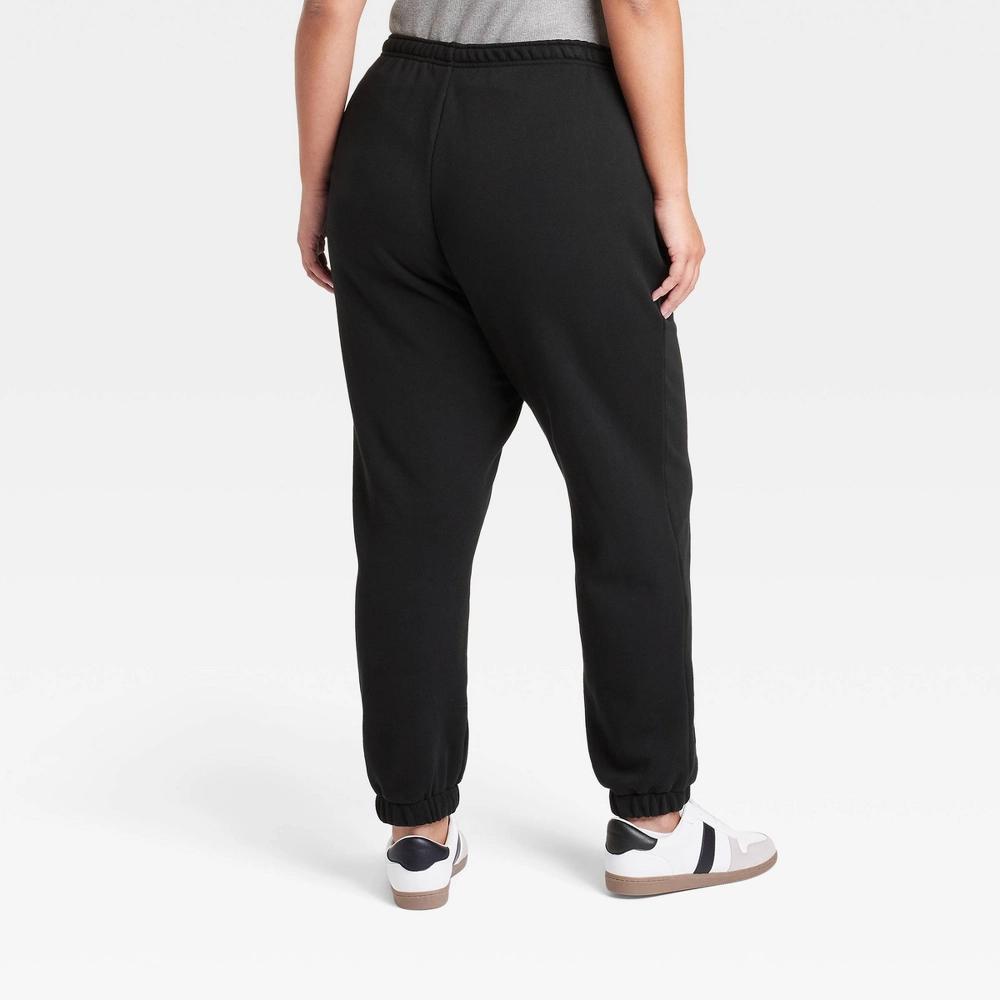 Women's Leisure Studio Mid-Rise Fleece Essential Joggers - Universal Thread™ Black 4X: Cotton Fleece, Elastic Waistband Product Image