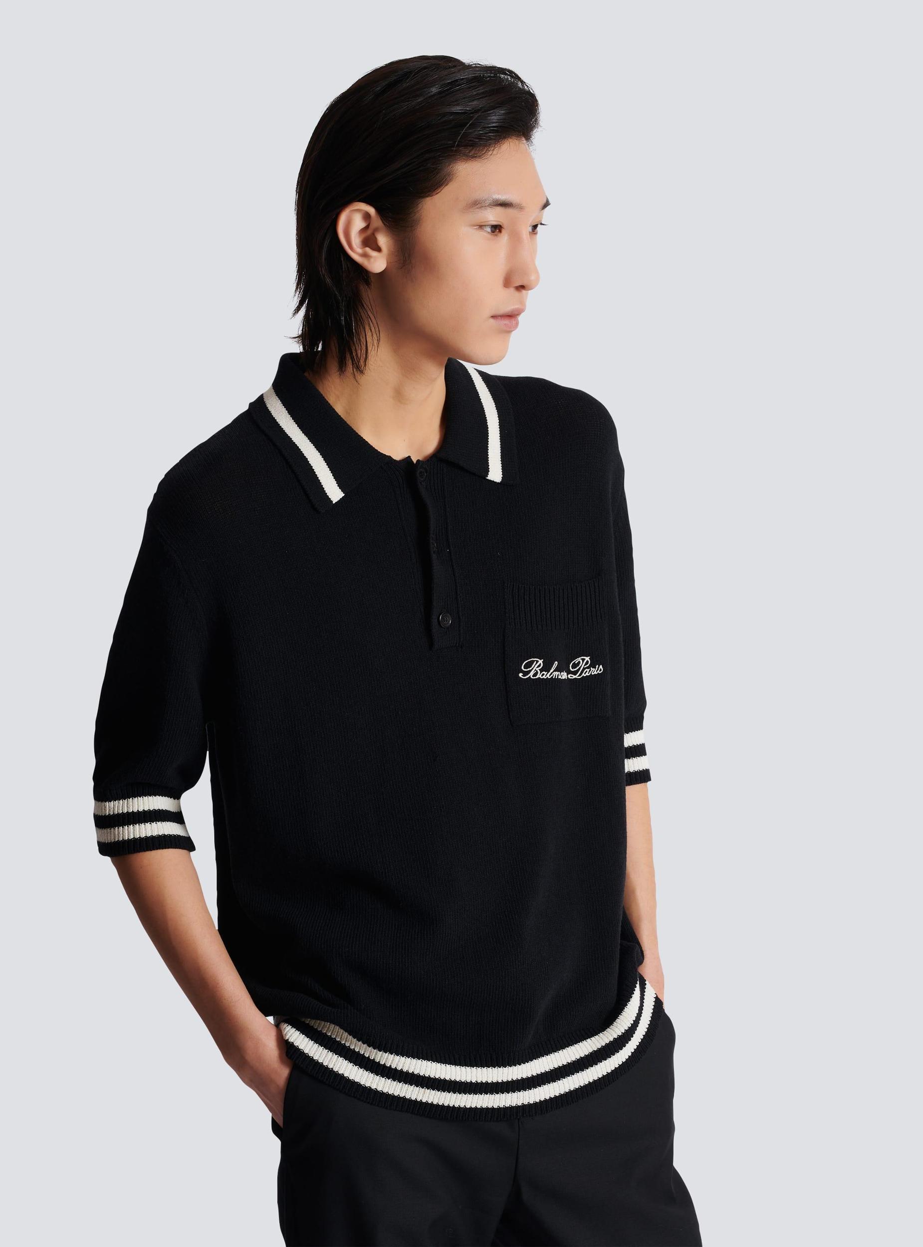 Wool polo shirt with Balmain Signature embroidery Product Image