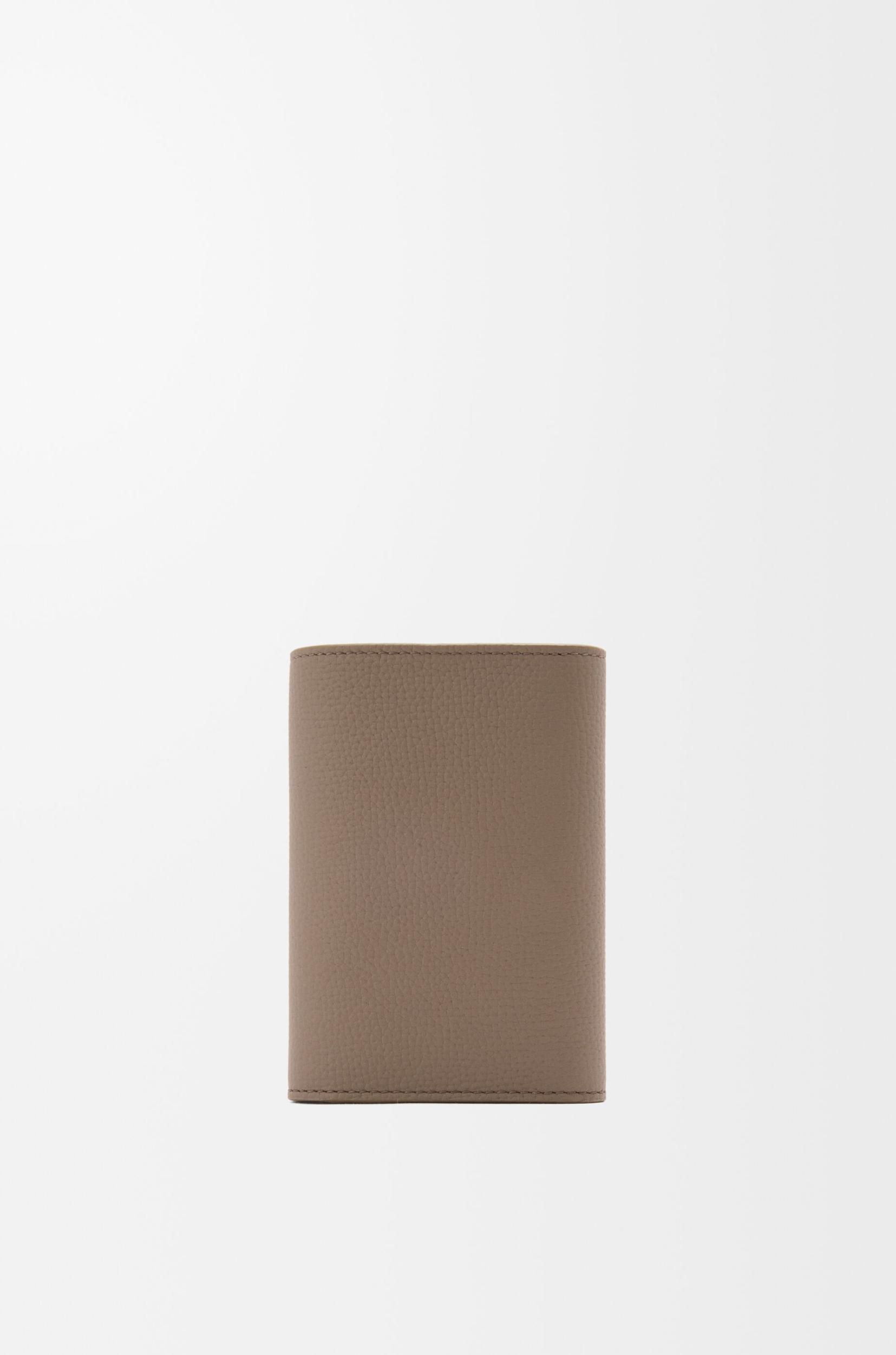 Anagram small vertical wallet in pebble grained calfskin Product Image