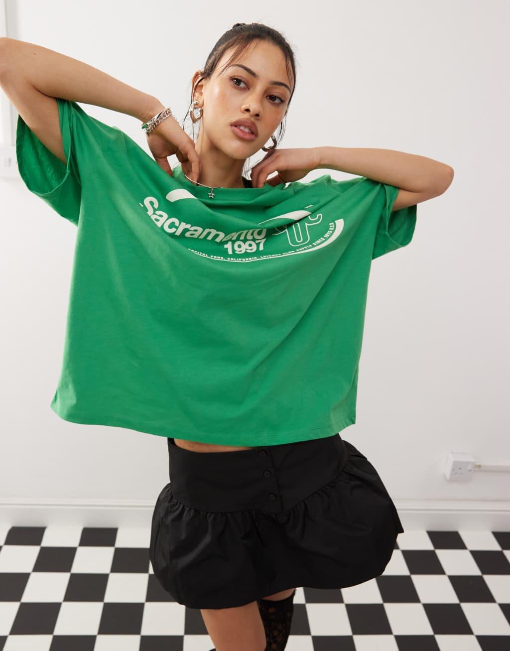 COLLUSION oversized t-shirt with Sacramento sports graphics in green  Product Image