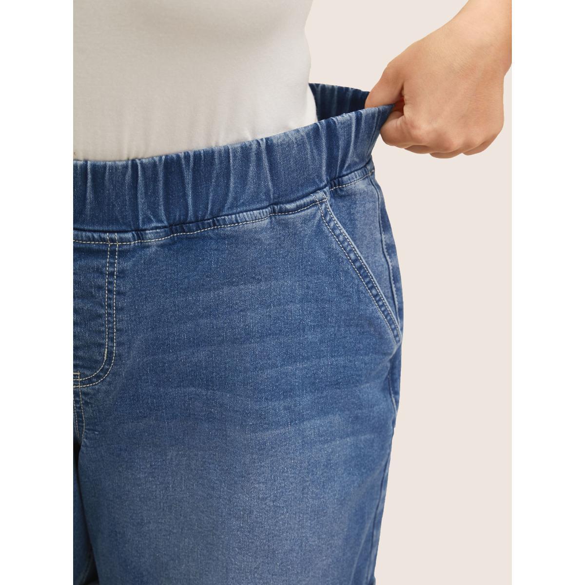 Plus Size Medium Wash Roll Hem Loose Denim Shorts Women Denimblue Roll Hem High stretch Everyday Slanted pocket Casual Denim Shorts BloomChic 14/1X Product Image