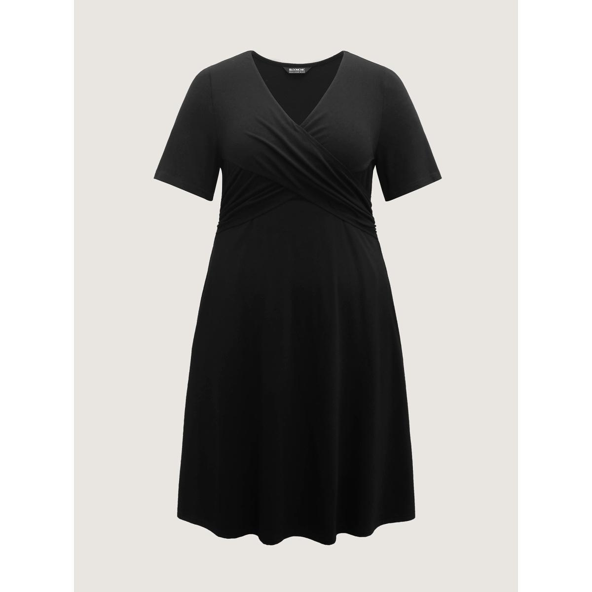 Plus Size Overlap Bodice Solid Knit Pockets Midi Dress Black Women Overlap Collar Short sleeve Curvy BloomChic 12/L Product Image
