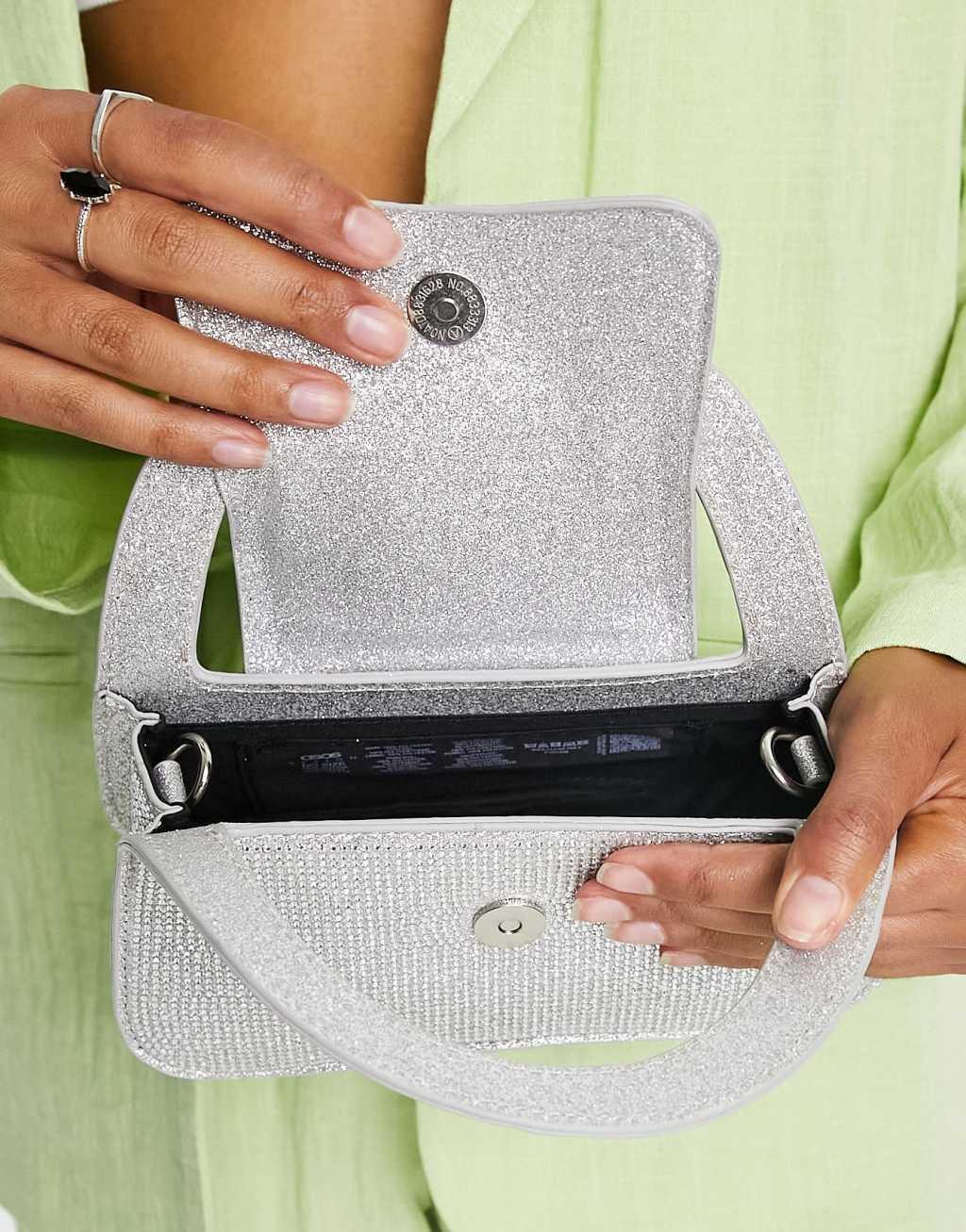 ASOS DESIGN curved clutch bag in diamante with detachable cross body strap Product Image