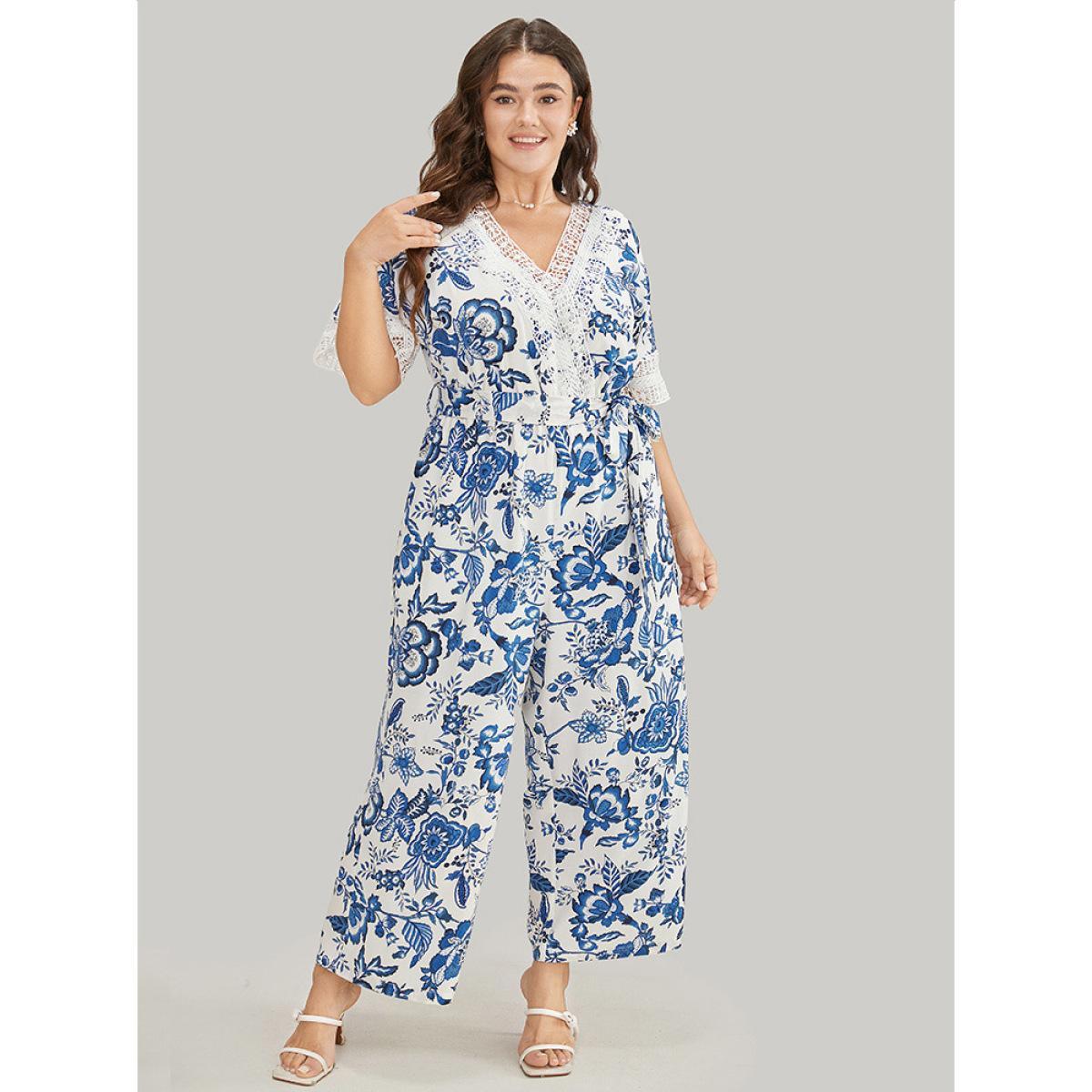 Plus Size Navy Floral Belted Pocket Lace Trim Wrap Jumpsuit Women Vacation Short sleeve V-neck Dailywear Loose Jumpsuits BloomChic 30/6X Product Image