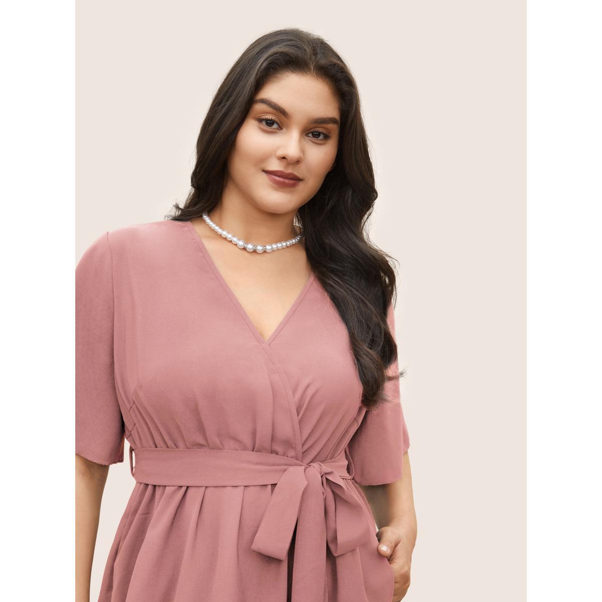 Plus Size Bloom Dress - Solid Tie Surplice Ruffle High Low Dress Lightpink Women Elegant Cross straps V-neck Short sleeve Curvy Midi Dress BloomChic 10/M Product Image