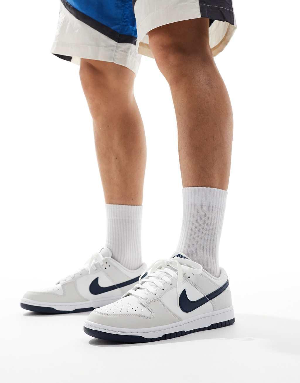 Nike Dunk Low Retro sneakers in white and navy Product Image