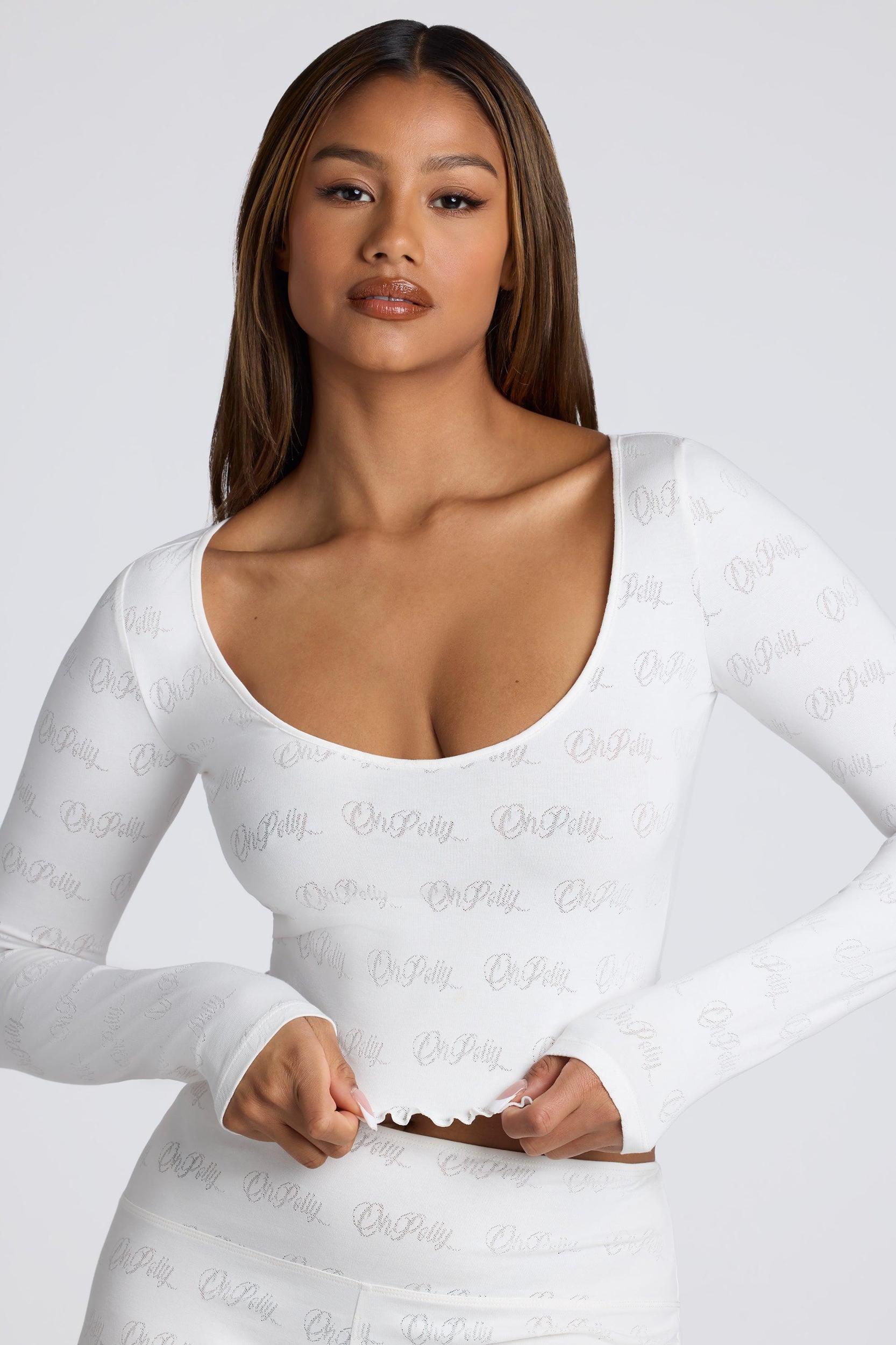Long Sleeve Scoop Neck Pointelle Crop Top in White Product Image
