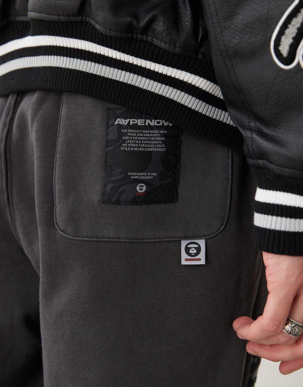 Aape By A Bathing Ape side logo cuffed sweatpants in washed gray Product Image