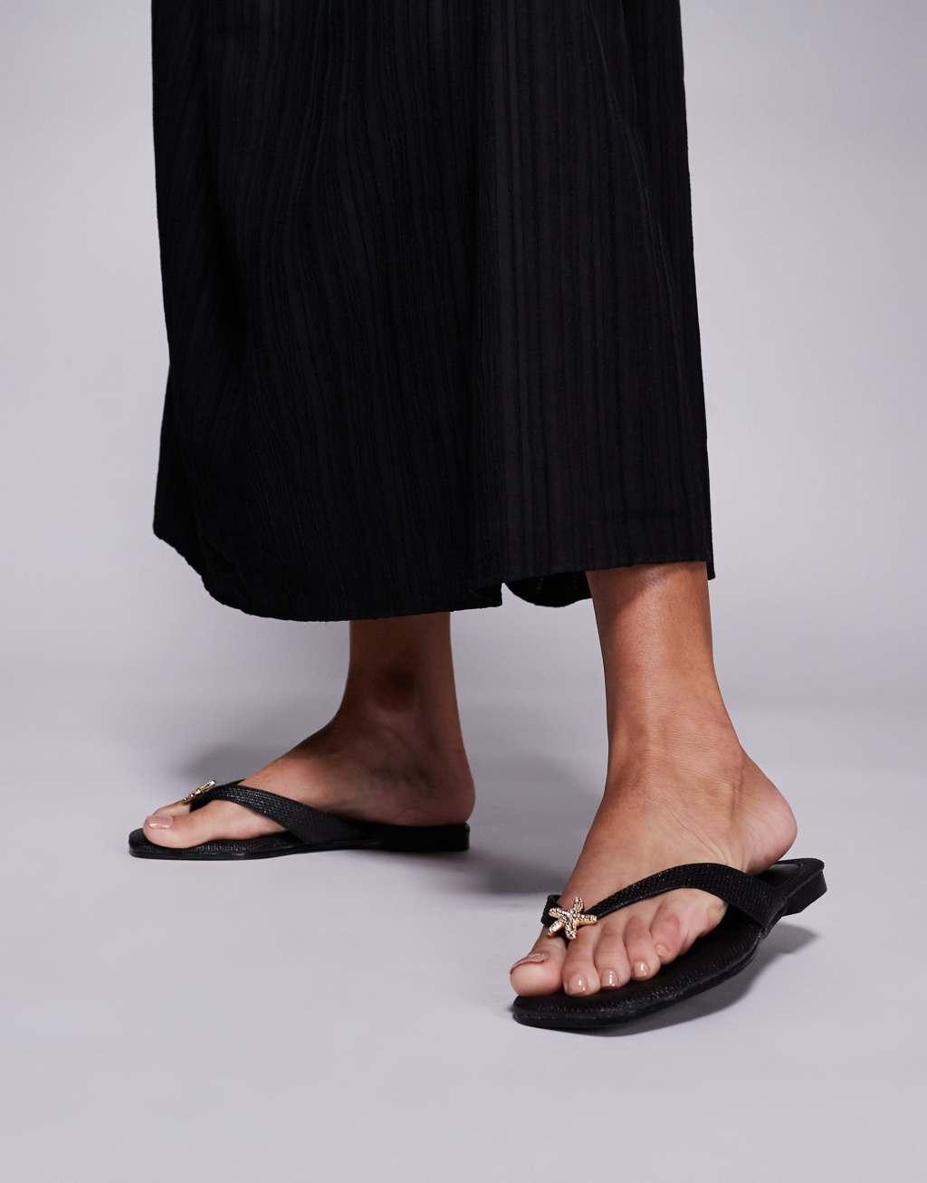 South Beach Flip Flop with Star Embelishment in Black Raffia Product Image