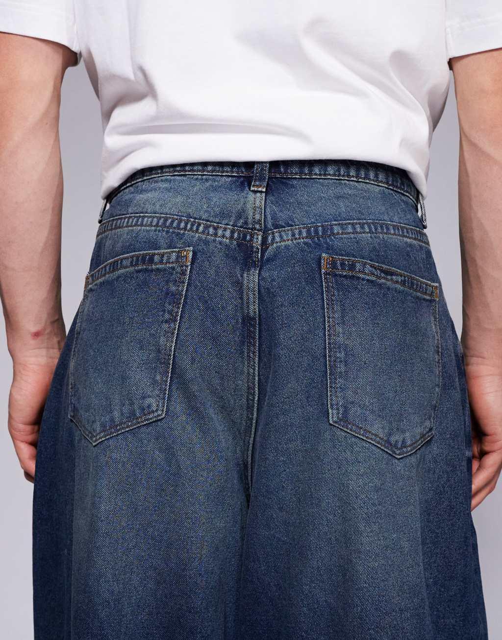 ASOS DESIGN oversized baggy fit jeans in vintage dark wash blue Product Image