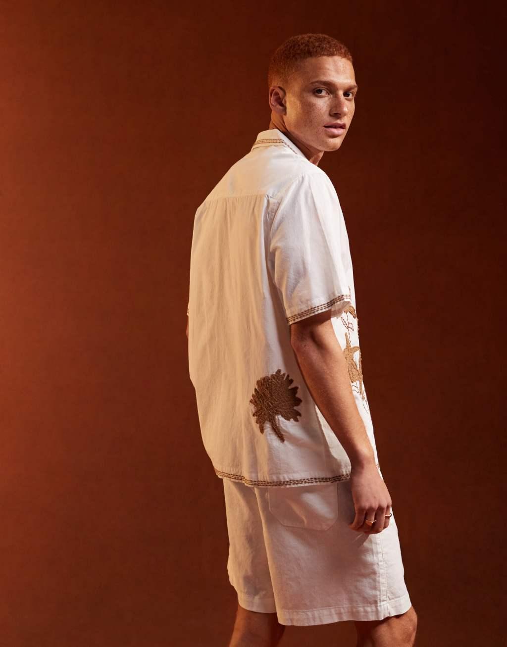 ASOS DESIGN relaxed revere shirt with embroidered border and floral applique Product Image