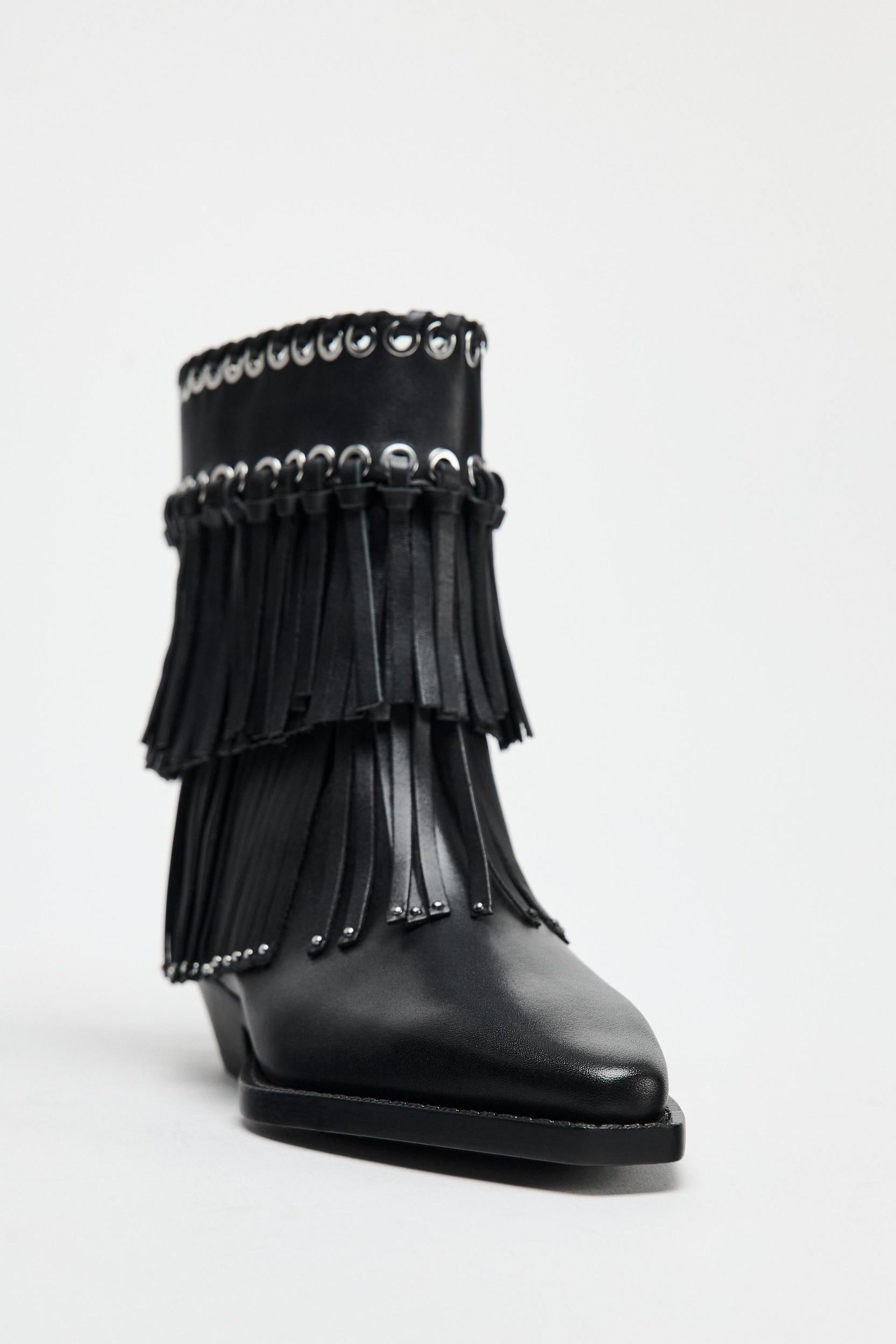 STUDDED FRINGED ANKLE BOOTS Product Image