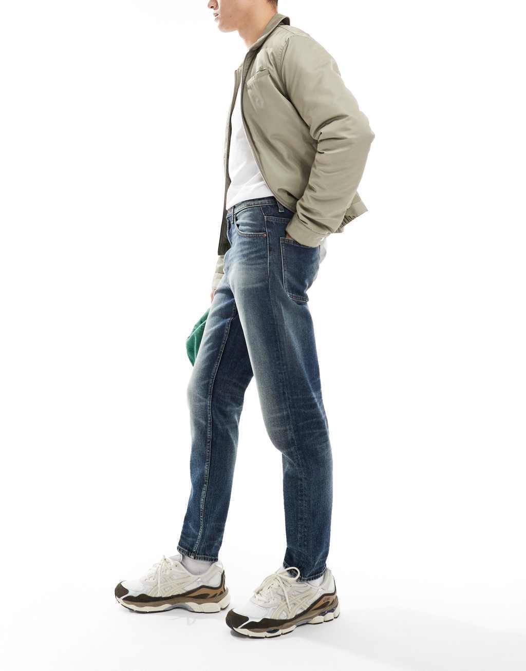 ASOS DESIGN tapered fit in midwash blue Product Image