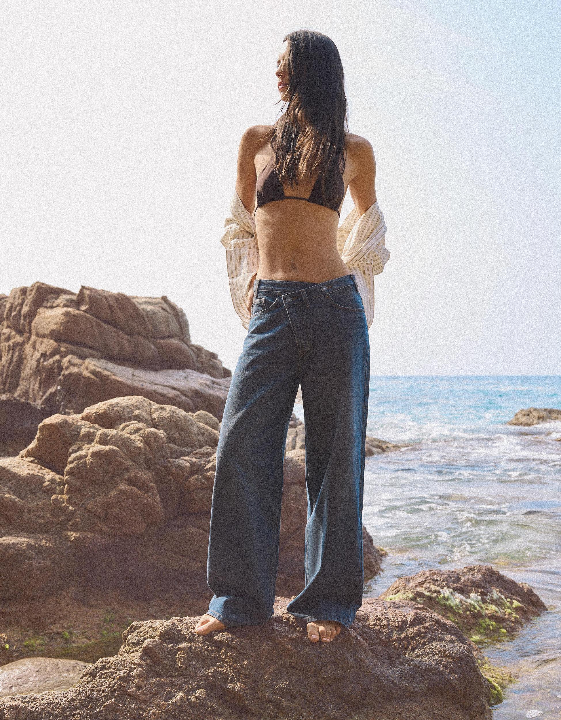 Wide leg jeans with crossover waistband Product Image