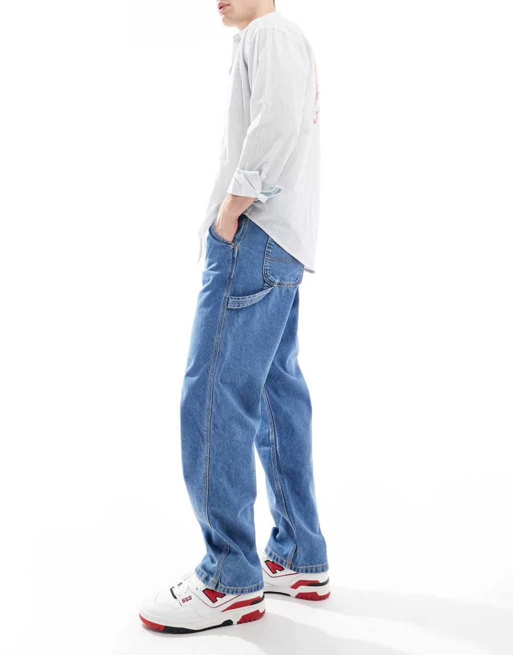 Jack & Jones Eddie loose carpenter jeans in mid wash blue Product Image