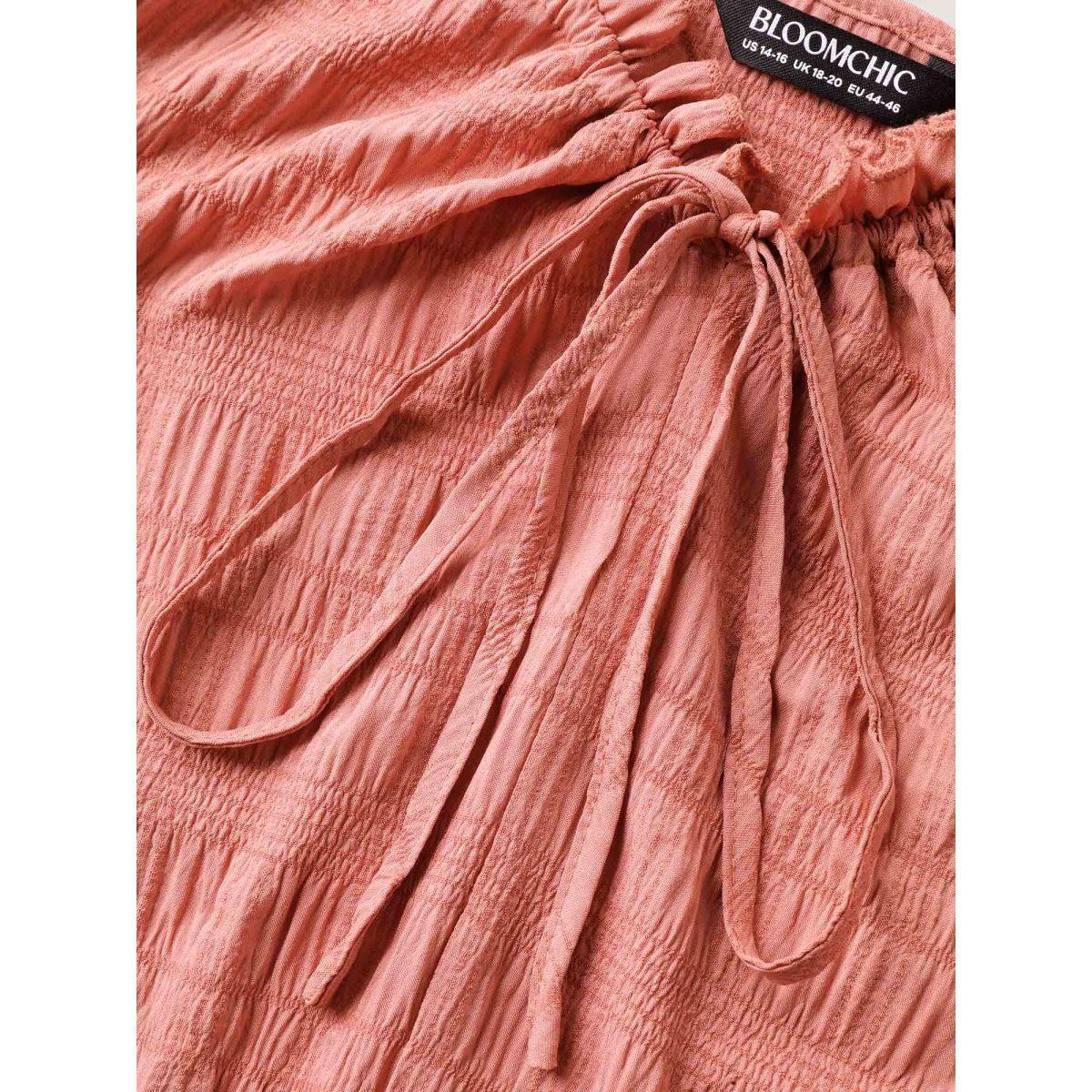 Plus Size Textured Neck-Tie Layered Pockets Midi Dress Rust Women V-neck Sleeveless Curvy BloomChic 14-16/1X Product Image